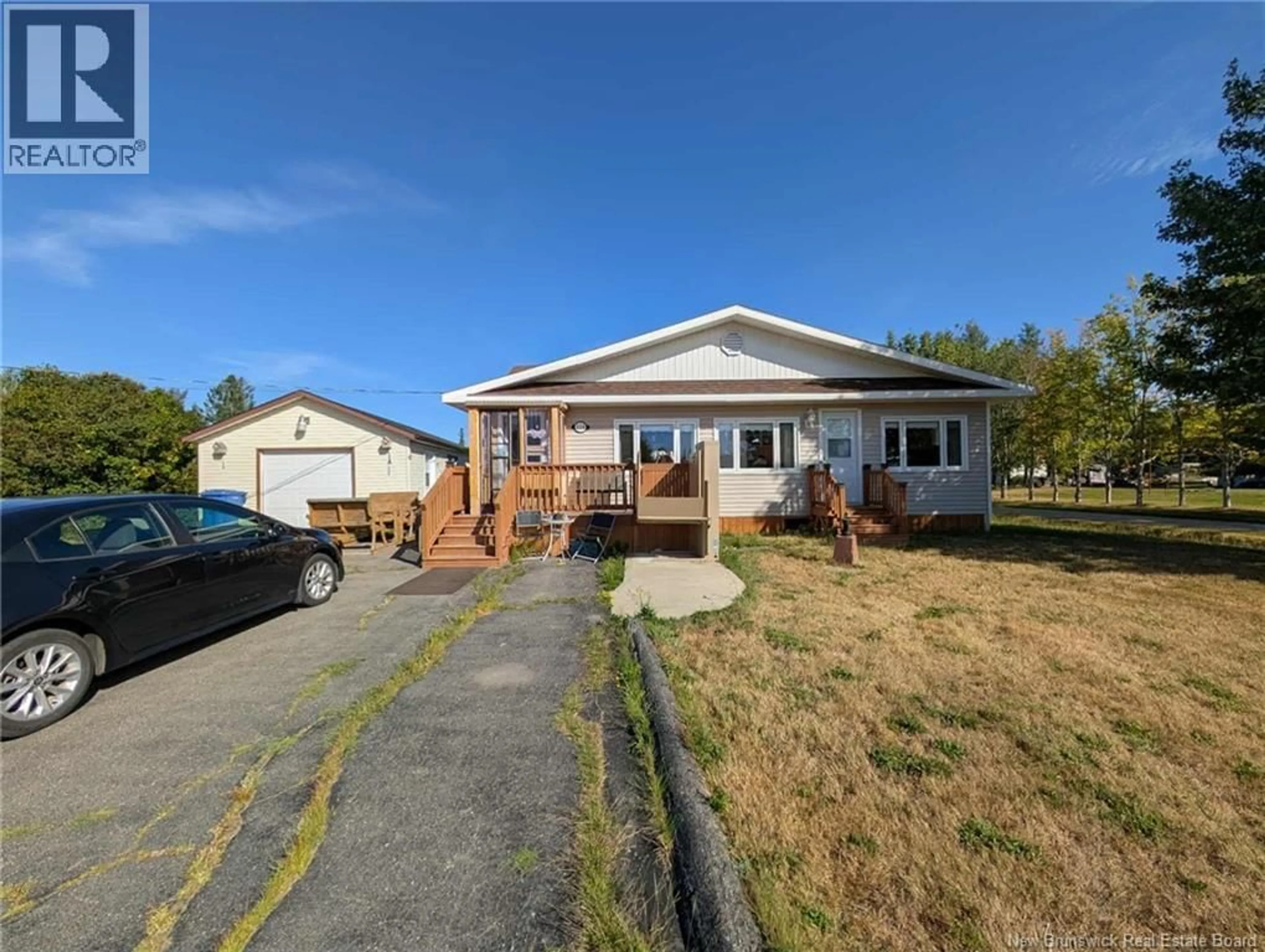 A pic from outside/outdoor area/front of a property/back of a property/a pic from drone, street for 228 DU MOULIN, Bertrand New Brunswick E1W1C8