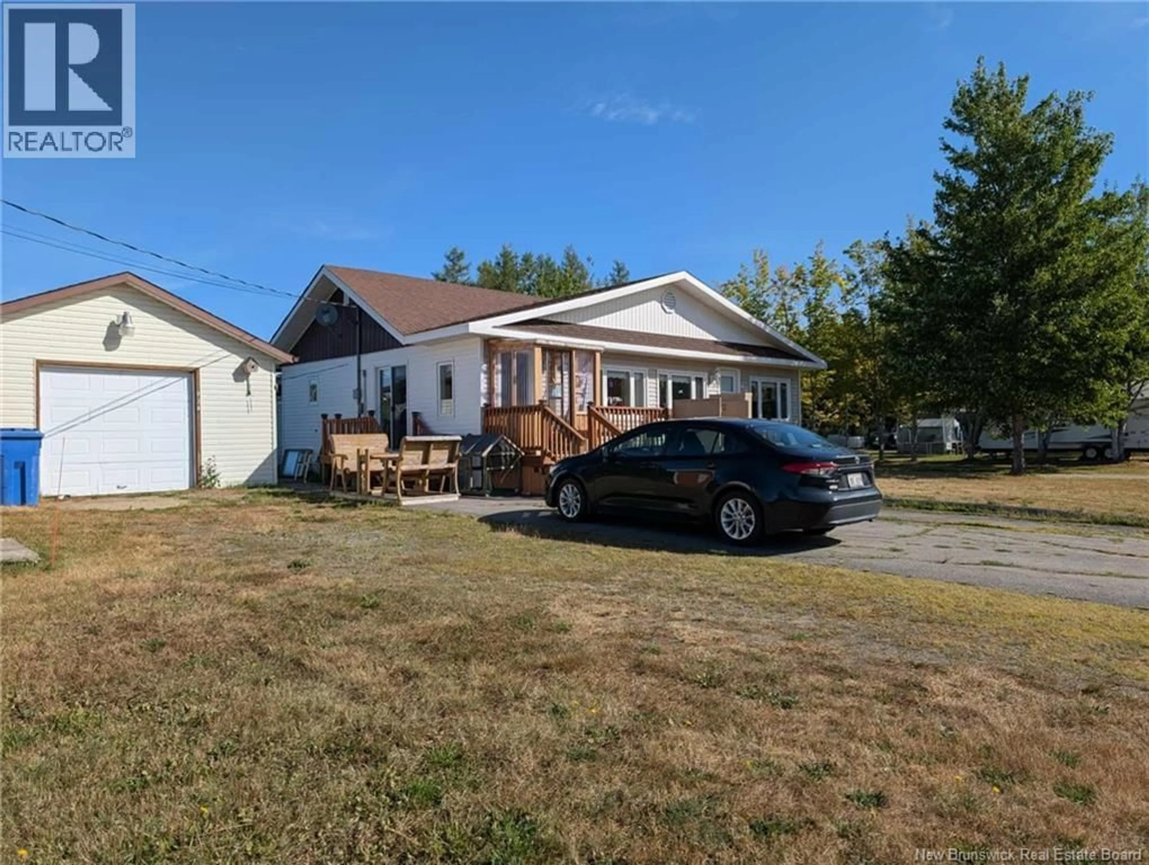 A pic from outside/outdoor area/front of a property/back of a property/a pic from drone, street for 228 DU MOULIN, Bertrand New Brunswick E1W1C8