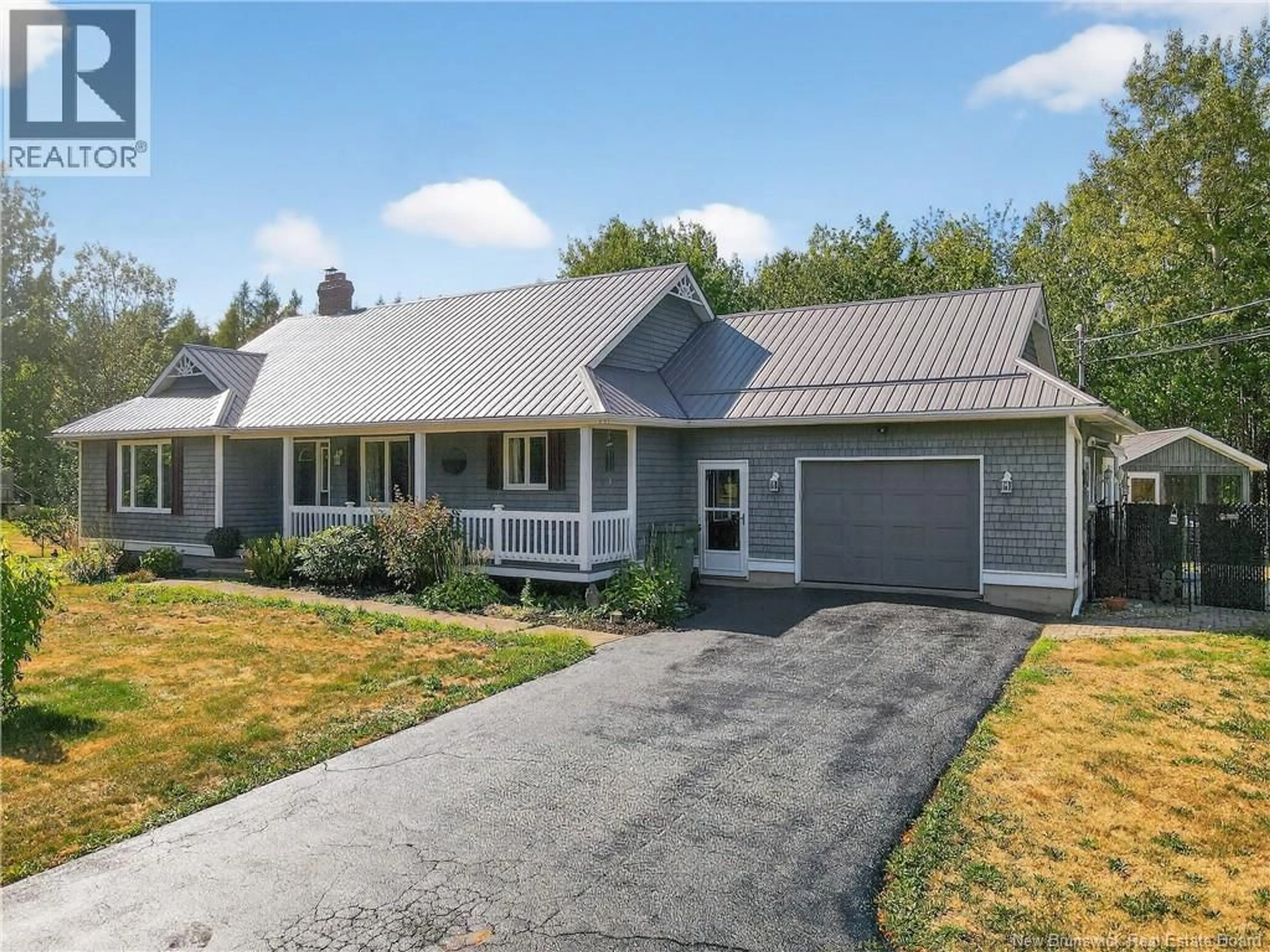 Home with vinyl exterior material, street for 2940 ROUTE 115, Irishtown New Brunswick E1H2N4