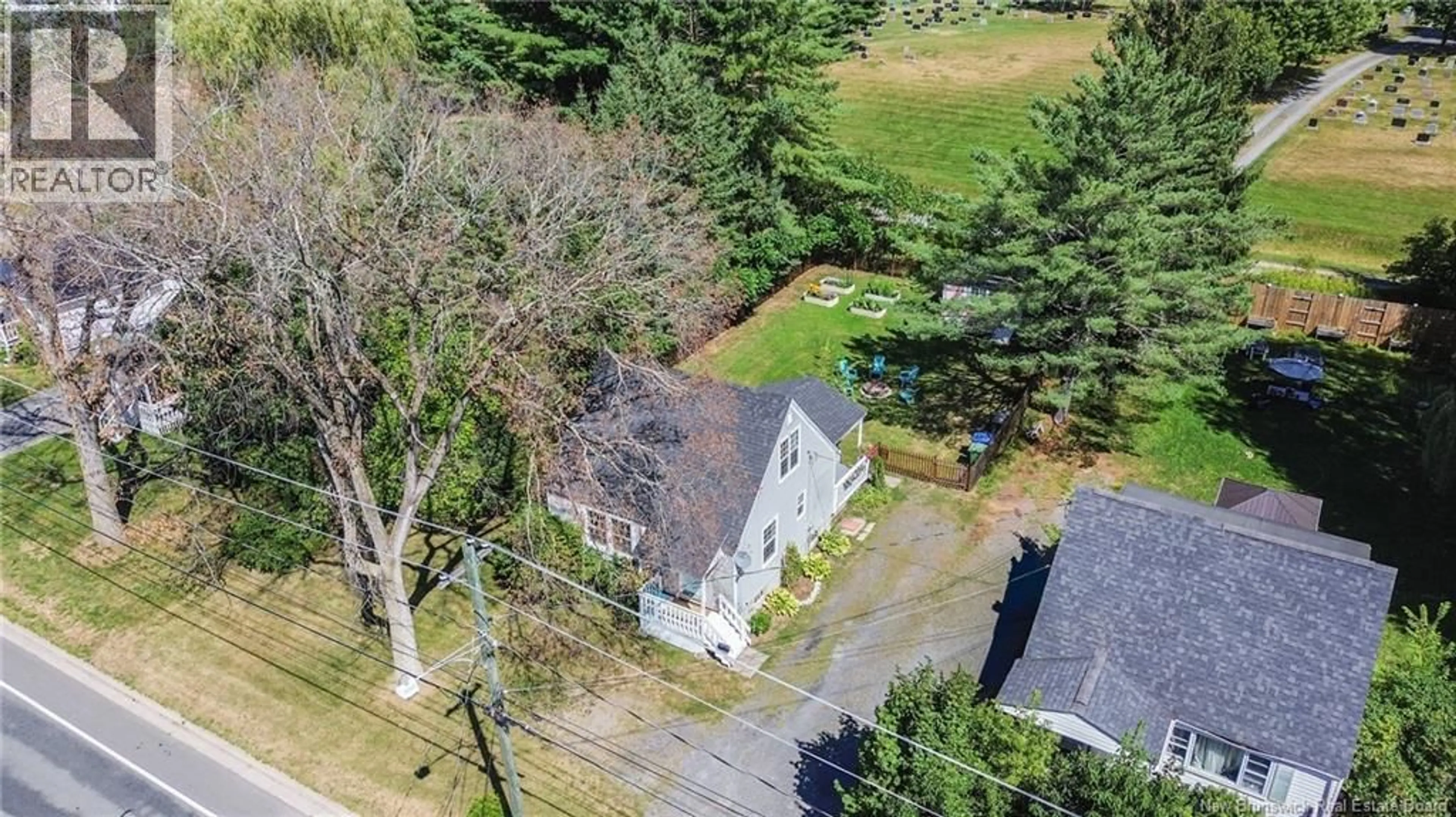 A pic from outside/outdoor area/front of a property/back of a property/a pic from drone, street for 735 MACLAREN AVENUE, Fredericton New Brunswick E3A3L4