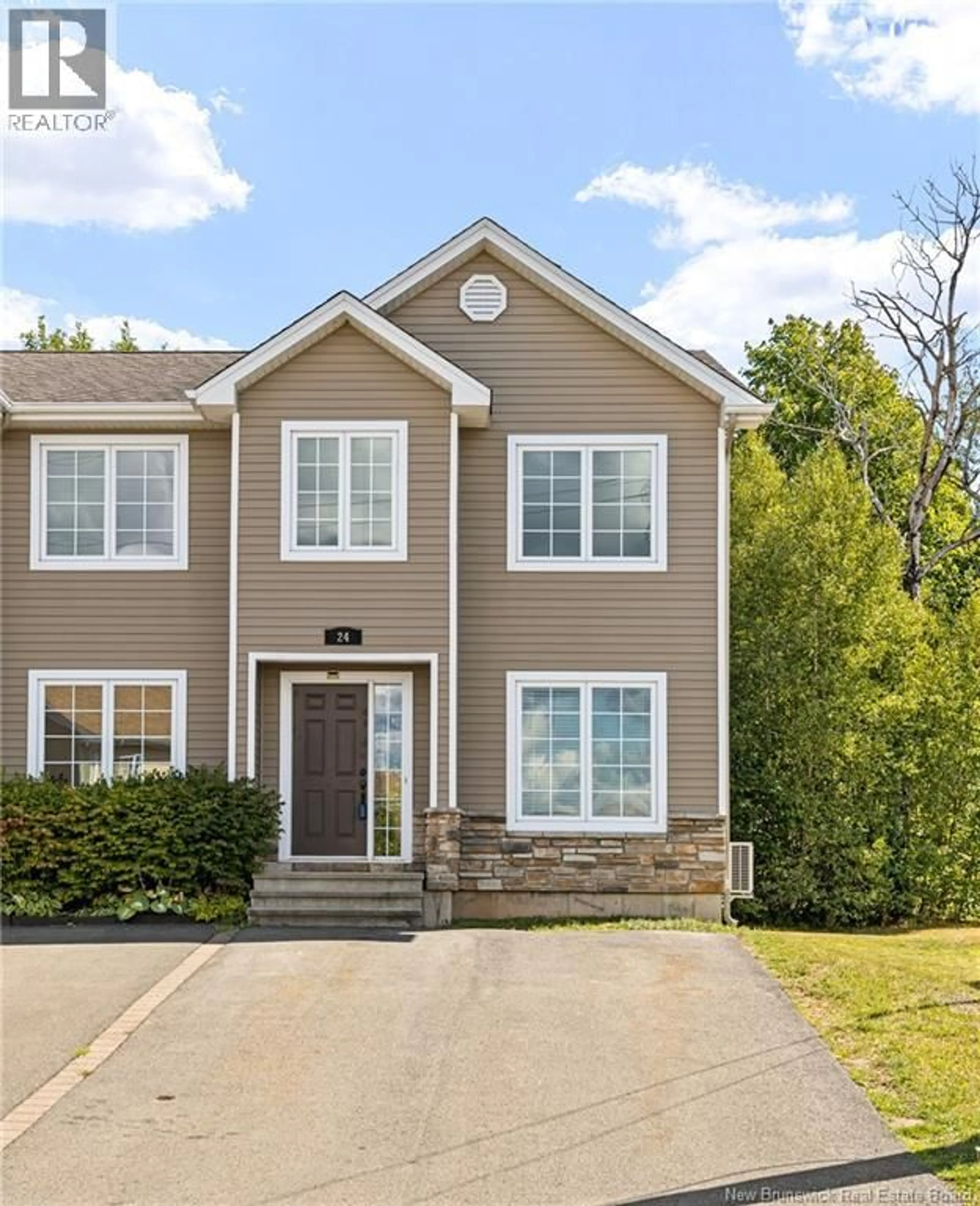 Home with vinyl exterior material, street for 24 LIONEL, Dieppe New Brunswick E1A8Z1