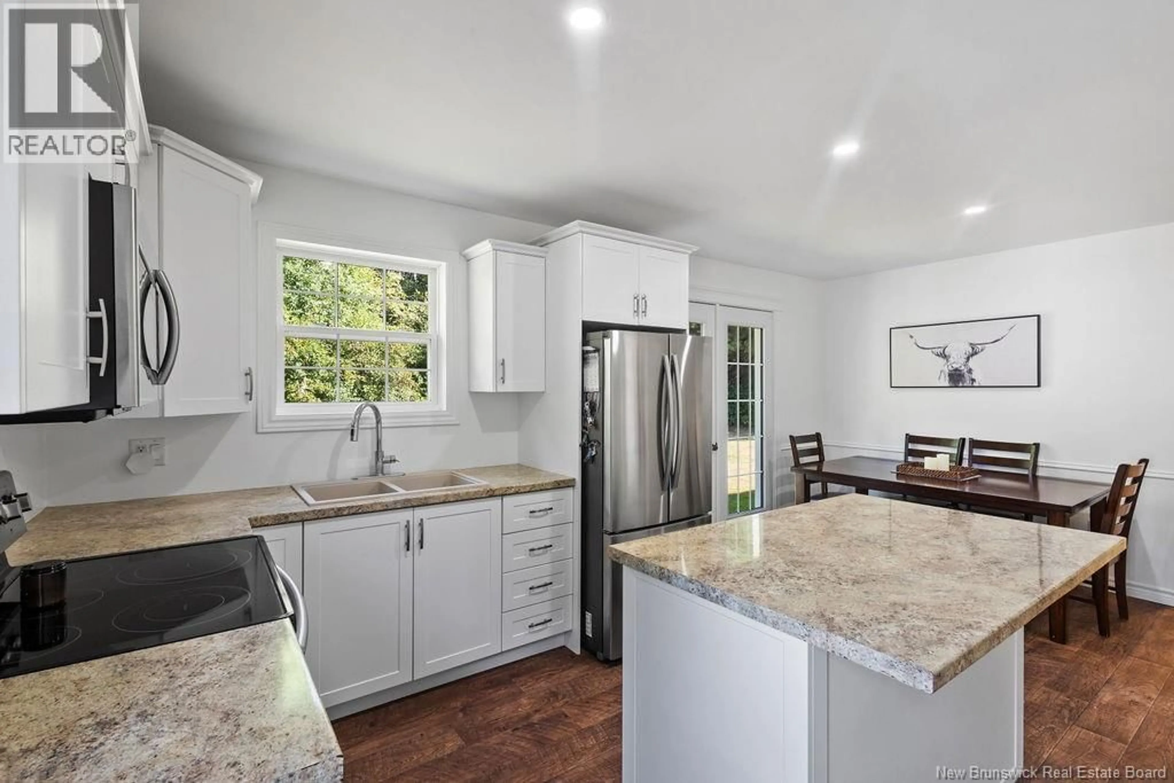 Open concept kitchen, ceramic/tile floor for 31 FLETT CRESCENT, Strathadam New Brunswick E1V4H7