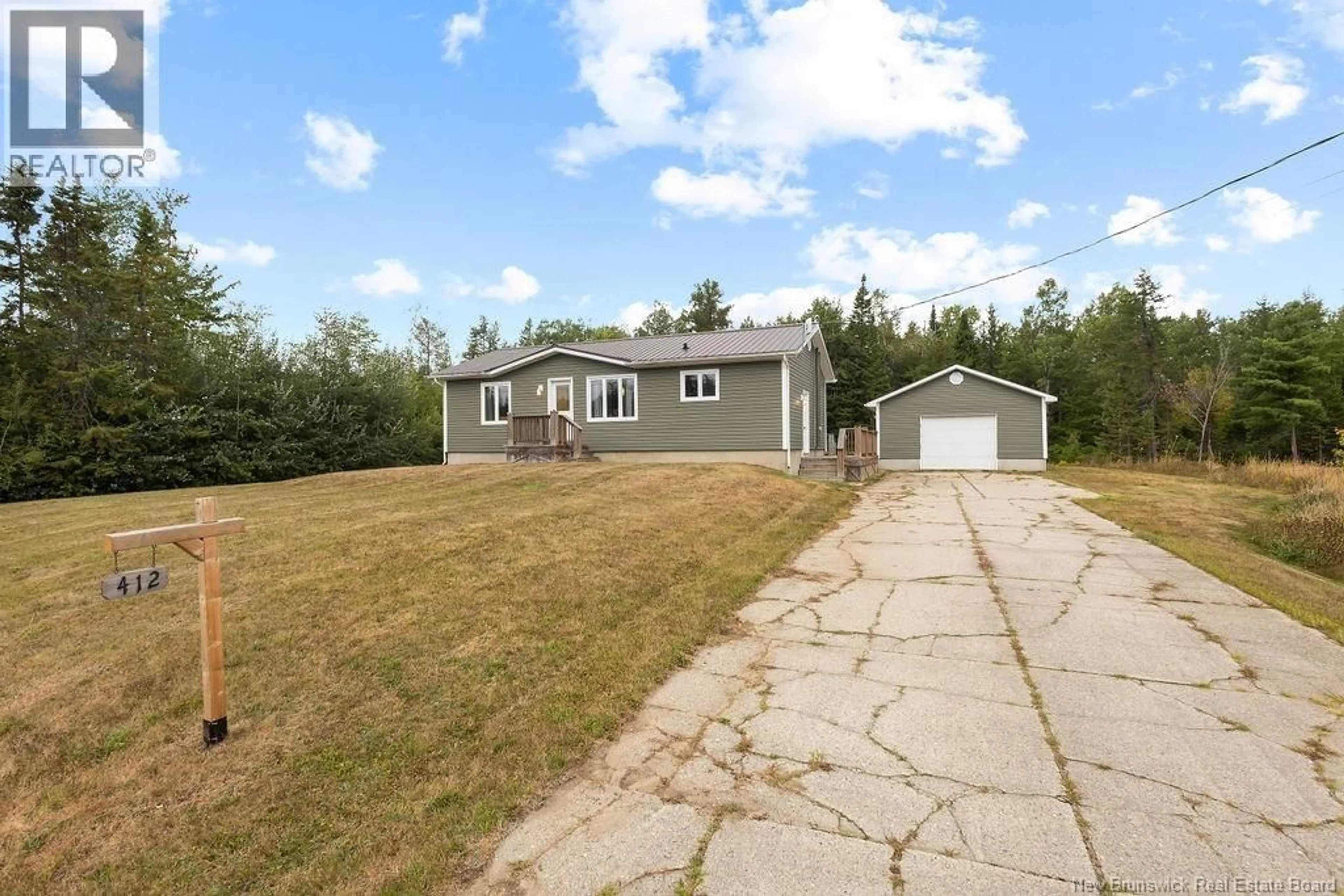 A pic from outside/outdoor area/front of a property/back of a property/a pic from drone, unknown for 412 CH SAPIN COURT, Rogersville New Brunswick E4Y1V4