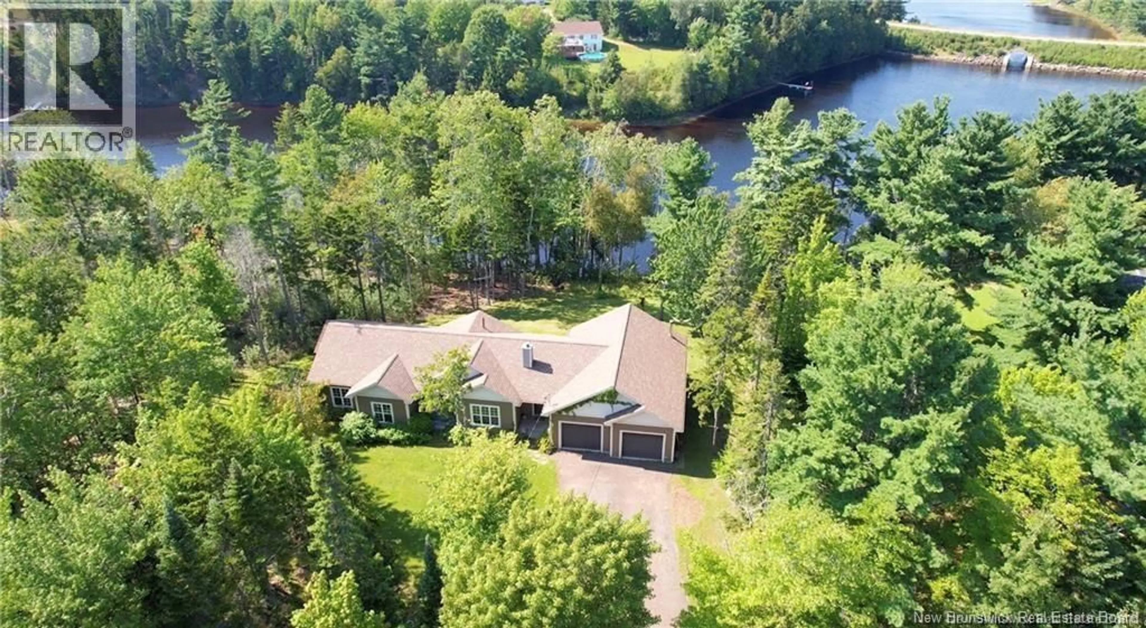 A pic from outside/outdoor area/front of a property/back of a property/a pic from drone, water/lake/river/ocean view for 16 WOODLAND DRIVE, Galloway New Brunswick E4W2G6