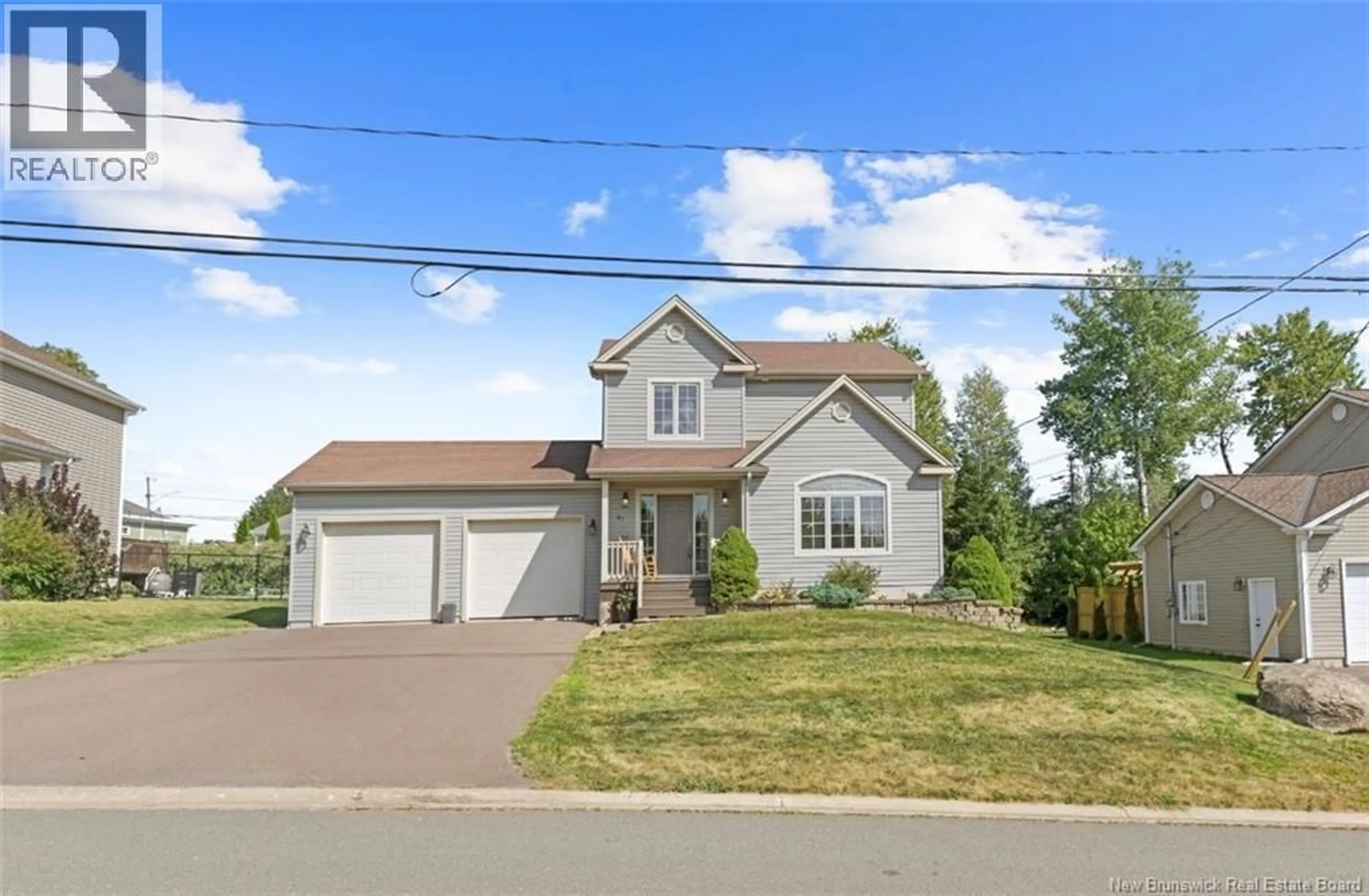 Home with vinyl exterior material, street for 41 CAMILLE STREET, Dieppe New Brunswick E1A0R5