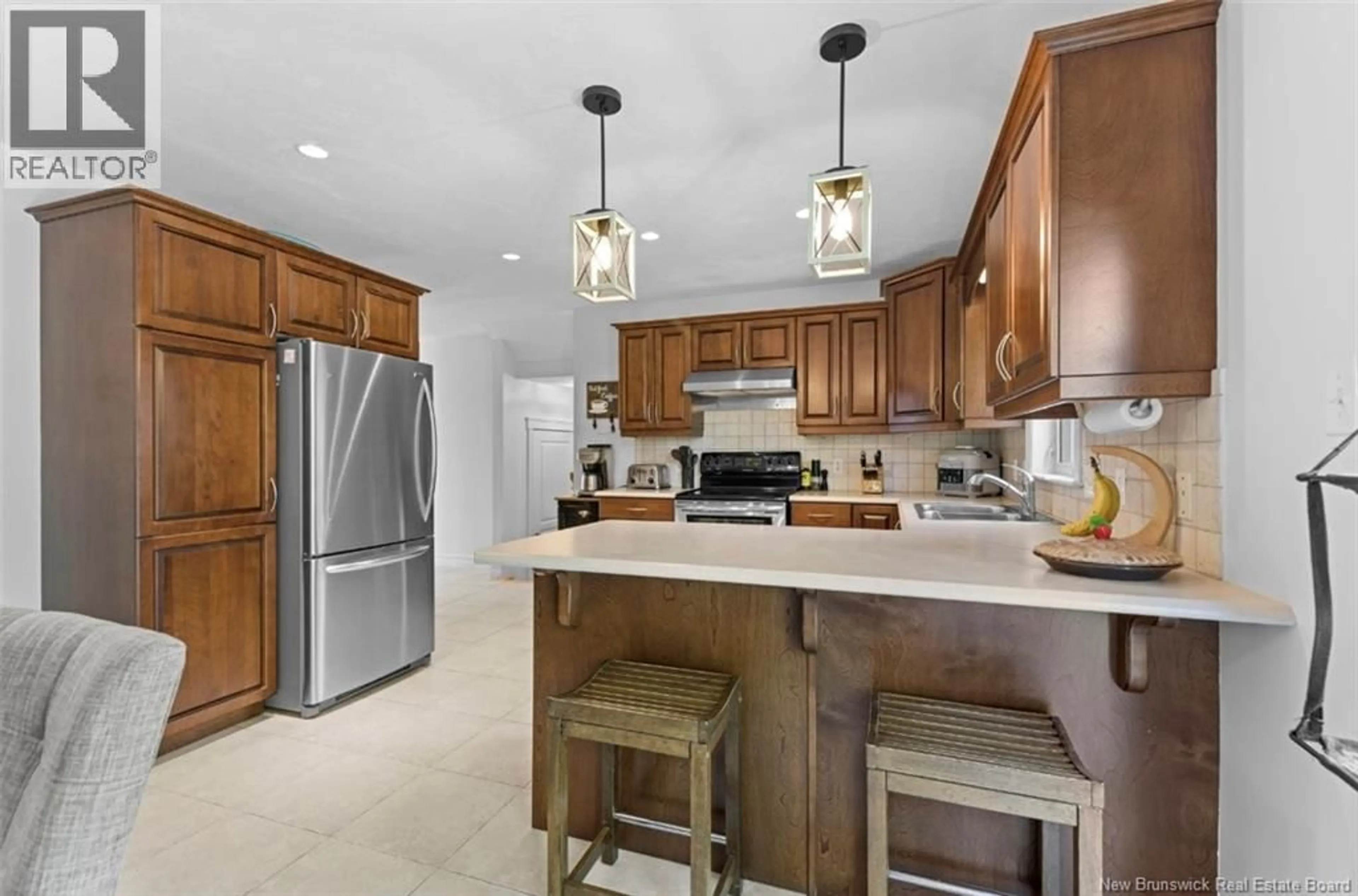 Open concept kitchen, ceramic/tile floor for 41 CAMILLE STREET, Dieppe New Brunswick E1A0R5