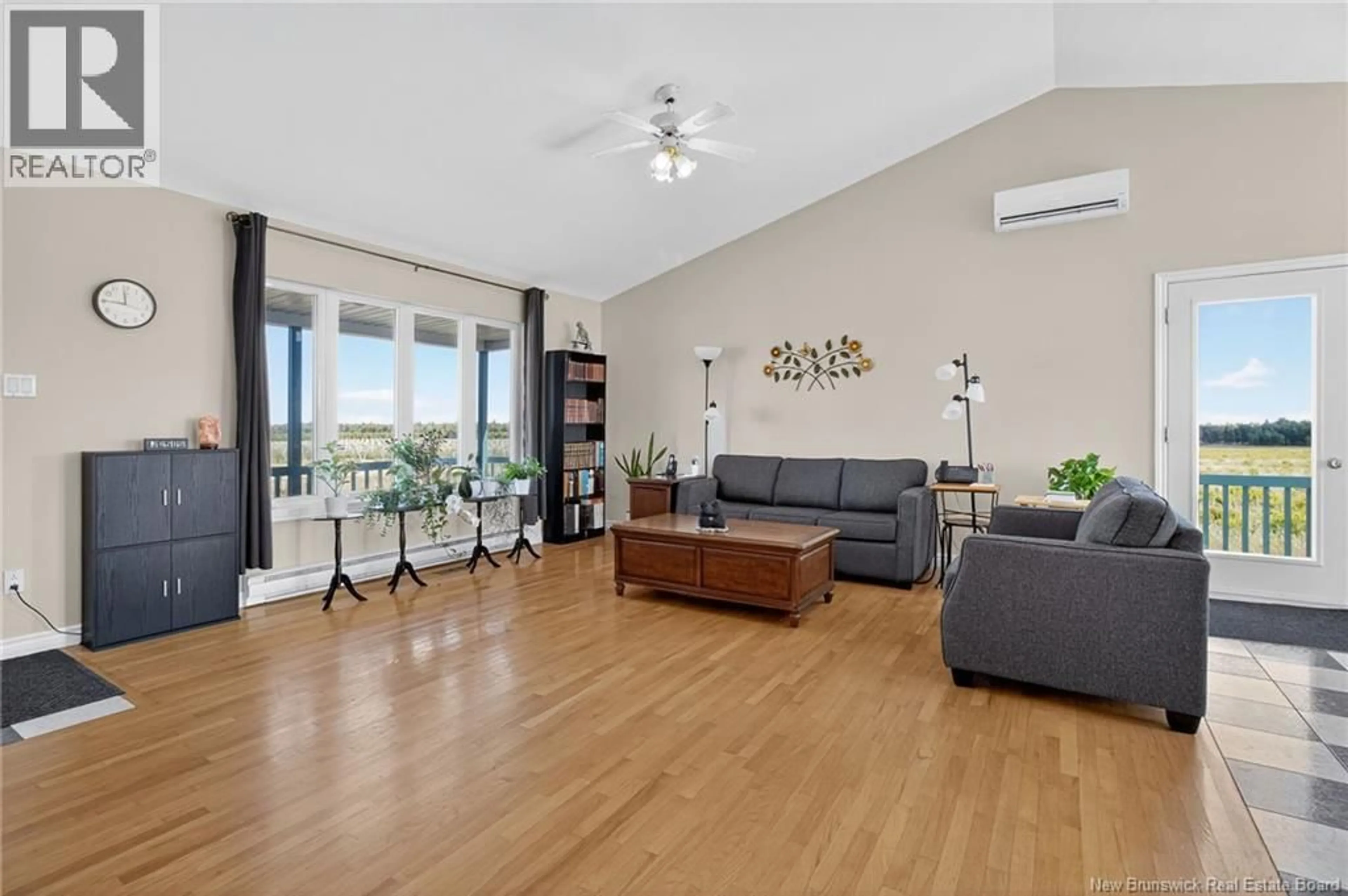 Living room with furniture, wood/laminate floor for 494 PERRY, Sainte-Anne-De-Kent New Brunswick E4S1C6