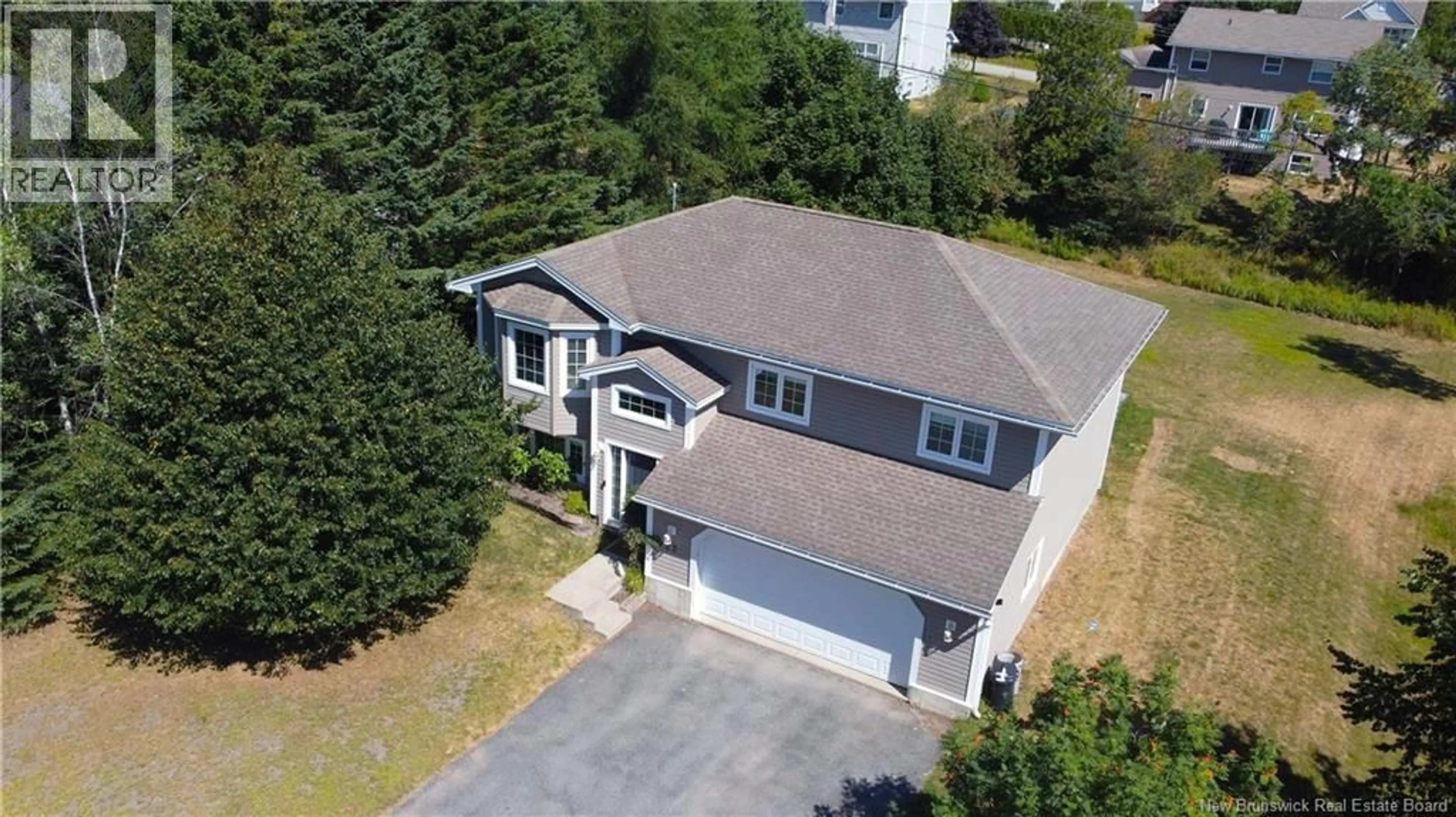 A pic from outside/outdoor area/front of a property/back of a property/a pic from drone, street for 22 MELANIE DRIVE, Quispamsis New Brunswick E2E1V9
