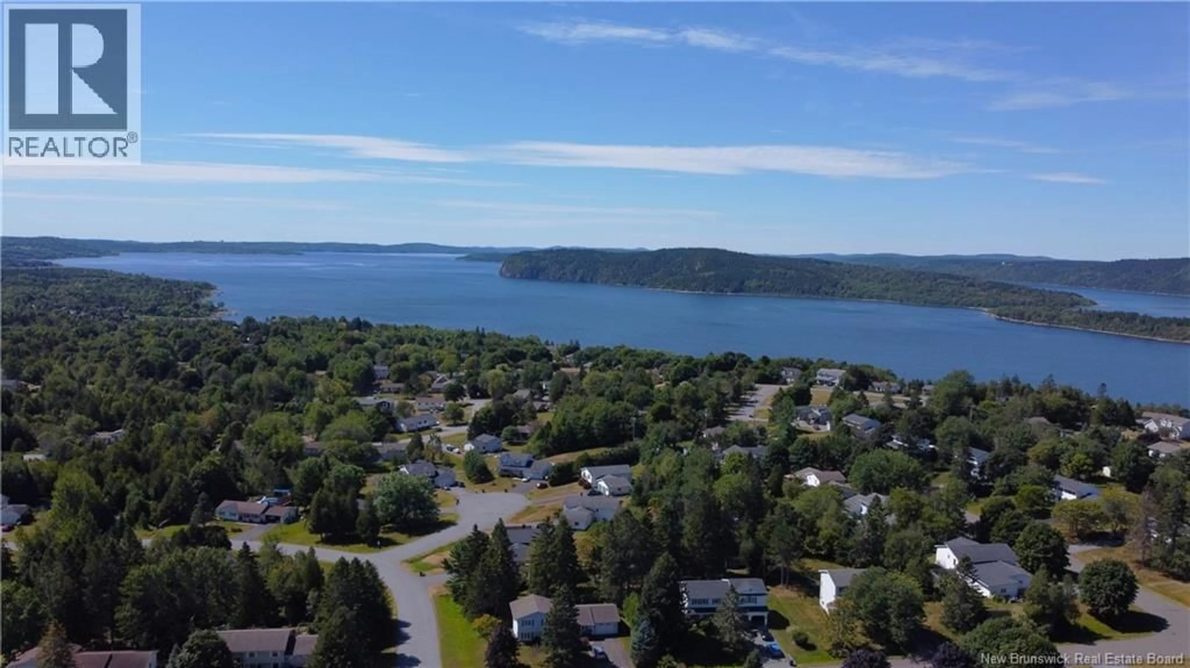 A pic from outside/outdoor area/front of a property/back of a property/a pic from drone, water/lake/river/ocean view for 22 MELANIE DRIVE, Quispamsis New Brunswick E2E1V9