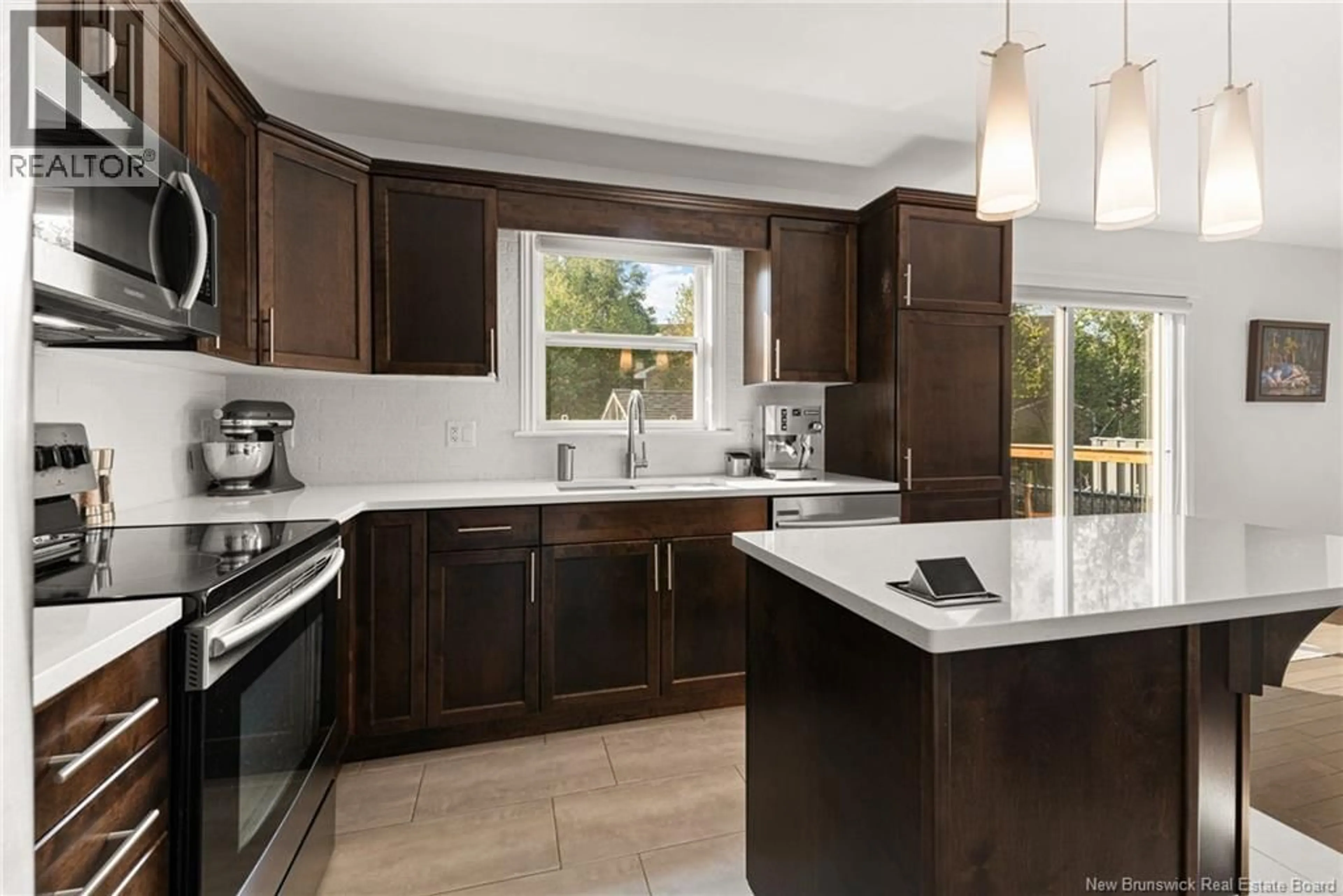 Open concept kitchen, ceramic/tile floor for 370 DOLBEAU STREET, Dieppe New Brunswick E1A9R1