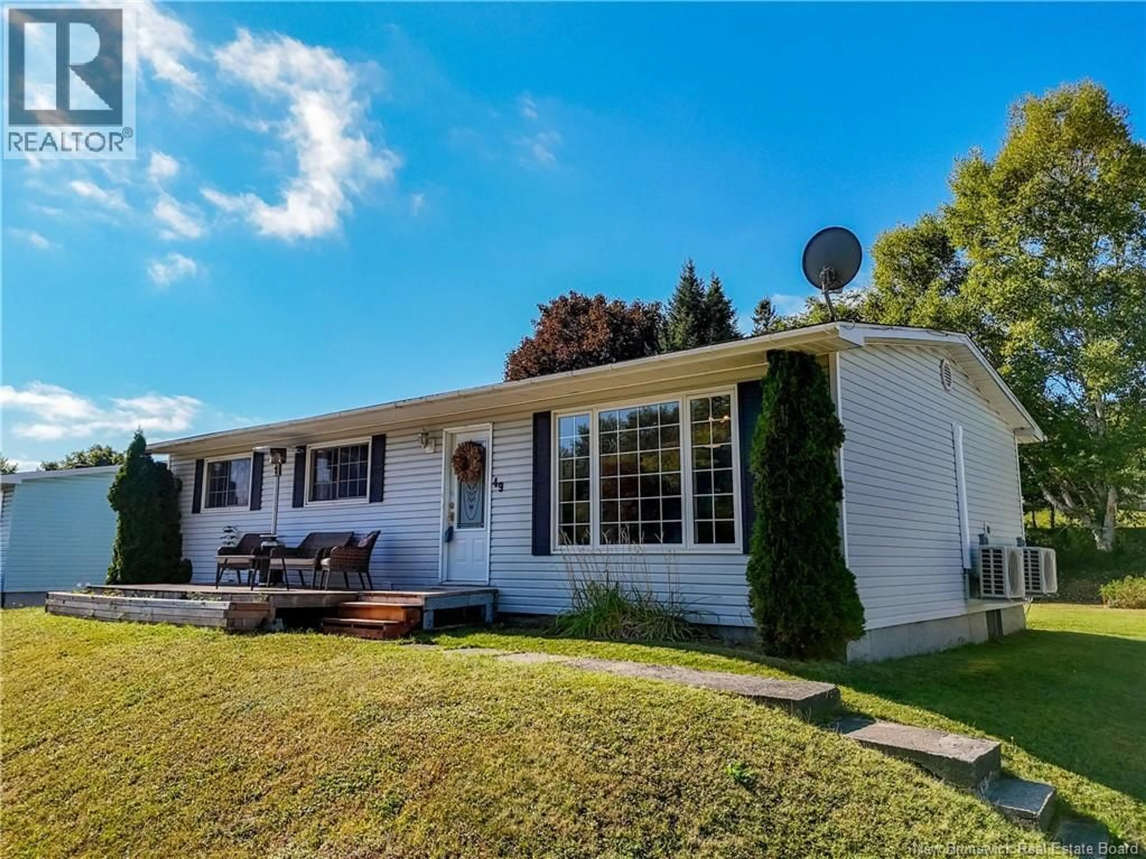 Home with vinyl exterior material, street for 49 OTIS DRIVE, Nackawic New Brunswick E6G1G7