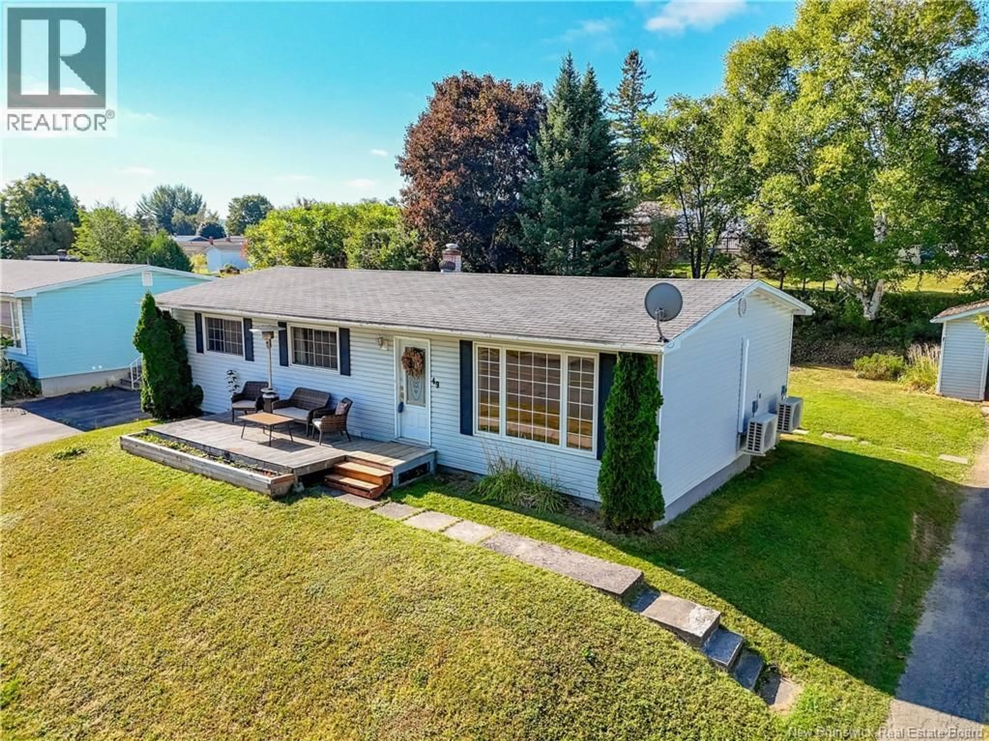 A pic from outside/outdoor area/front of a property/back of a property/a pic from drone, unknown for 49 OTIS DRIVE, Nackawic New Brunswick E6G1G7