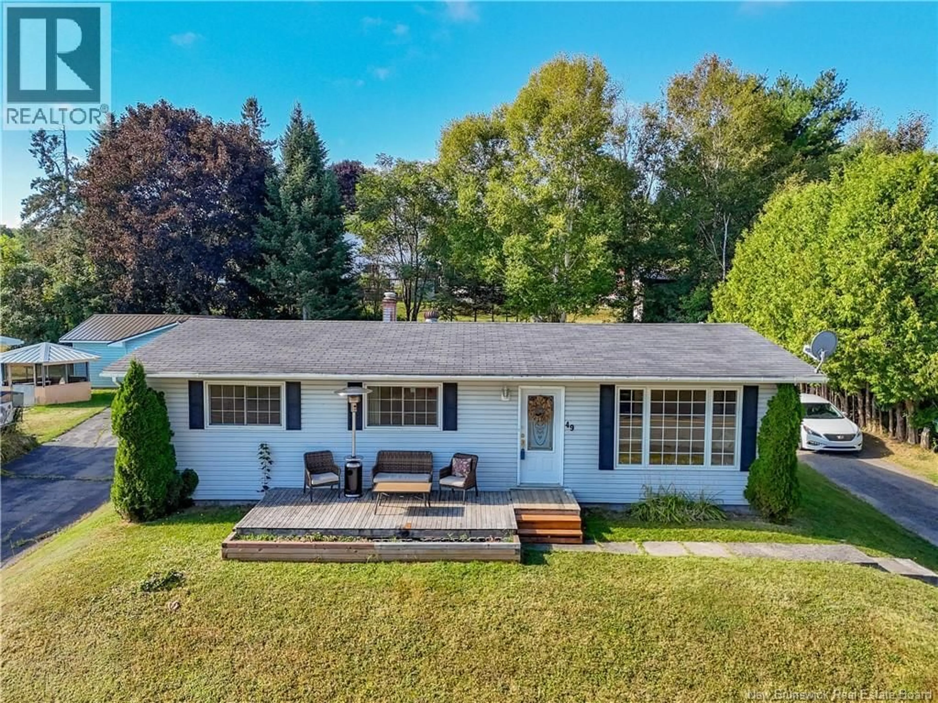 A pic from outside/outdoor area/front of a property/back of a property/a pic from drone, unknown for 49 OTIS DRIVE, Nackawic New Brunswick E6G1G7