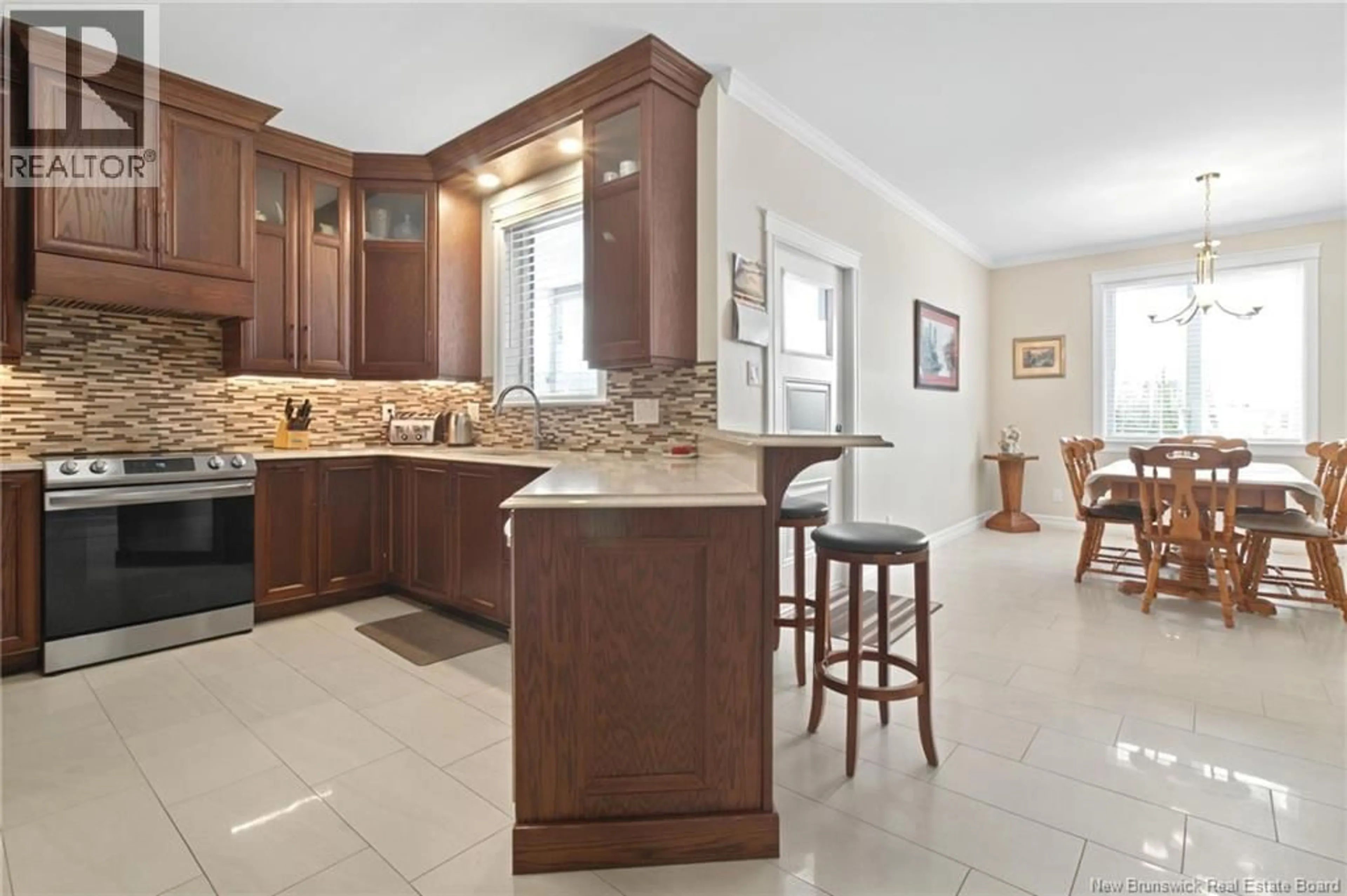 Open concept kitchen, ceramic/tile floor for 47 LOUIS-ARTHUR COURT, Dieppe New Brunswick E1A9M5