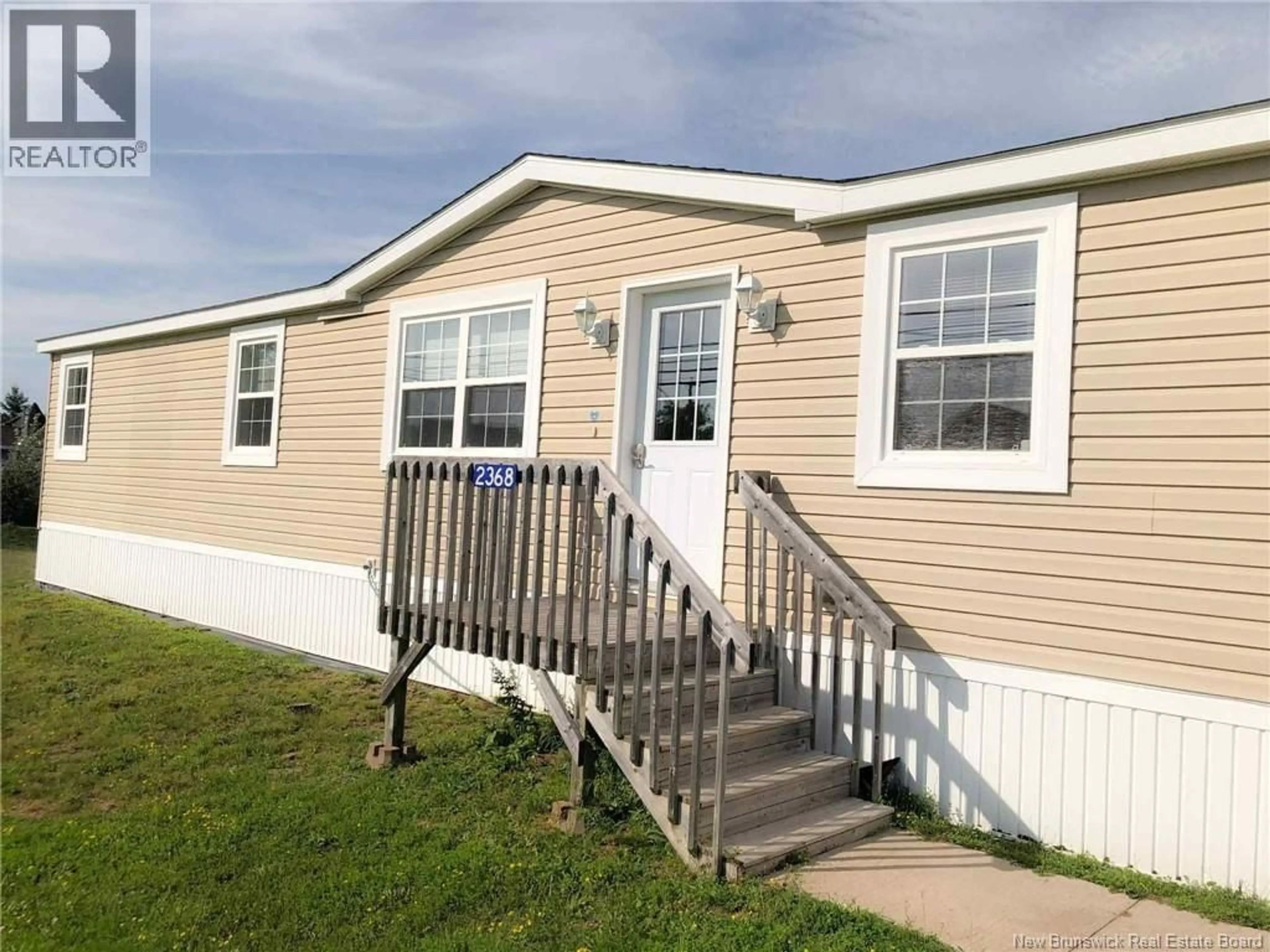 Home with vinyl exterior material, street for 2368 ACADIE ROAD, Cap-Pelé New Brunswick E4N1C8
