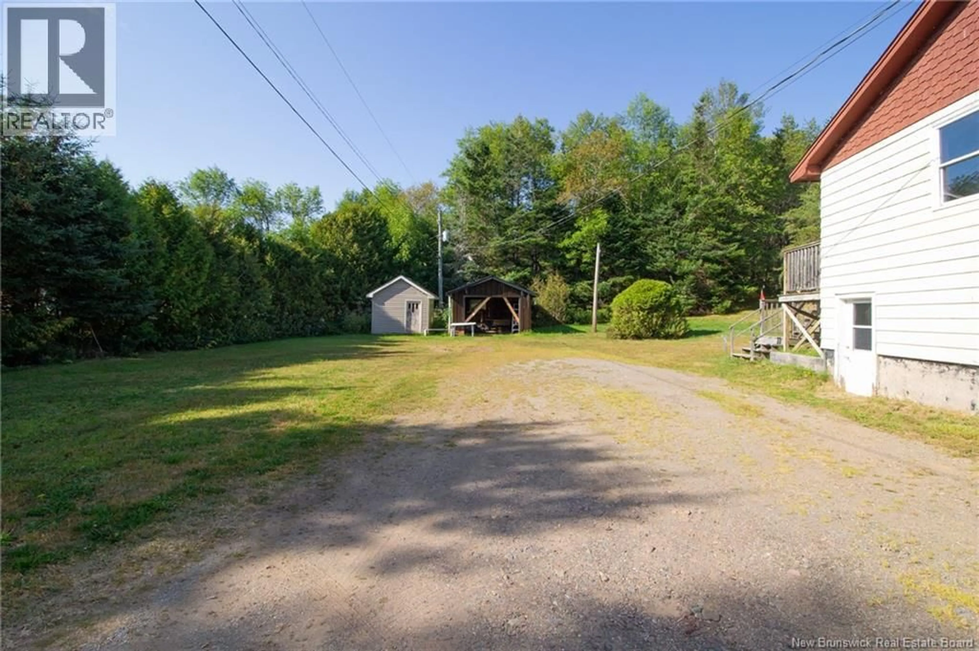 A pic from outside/outdoor area/front of a property/back of a property/a pic from drone, street for 116 PERRY POINT ROAD, Kingston New Brunswick E5N1J1
