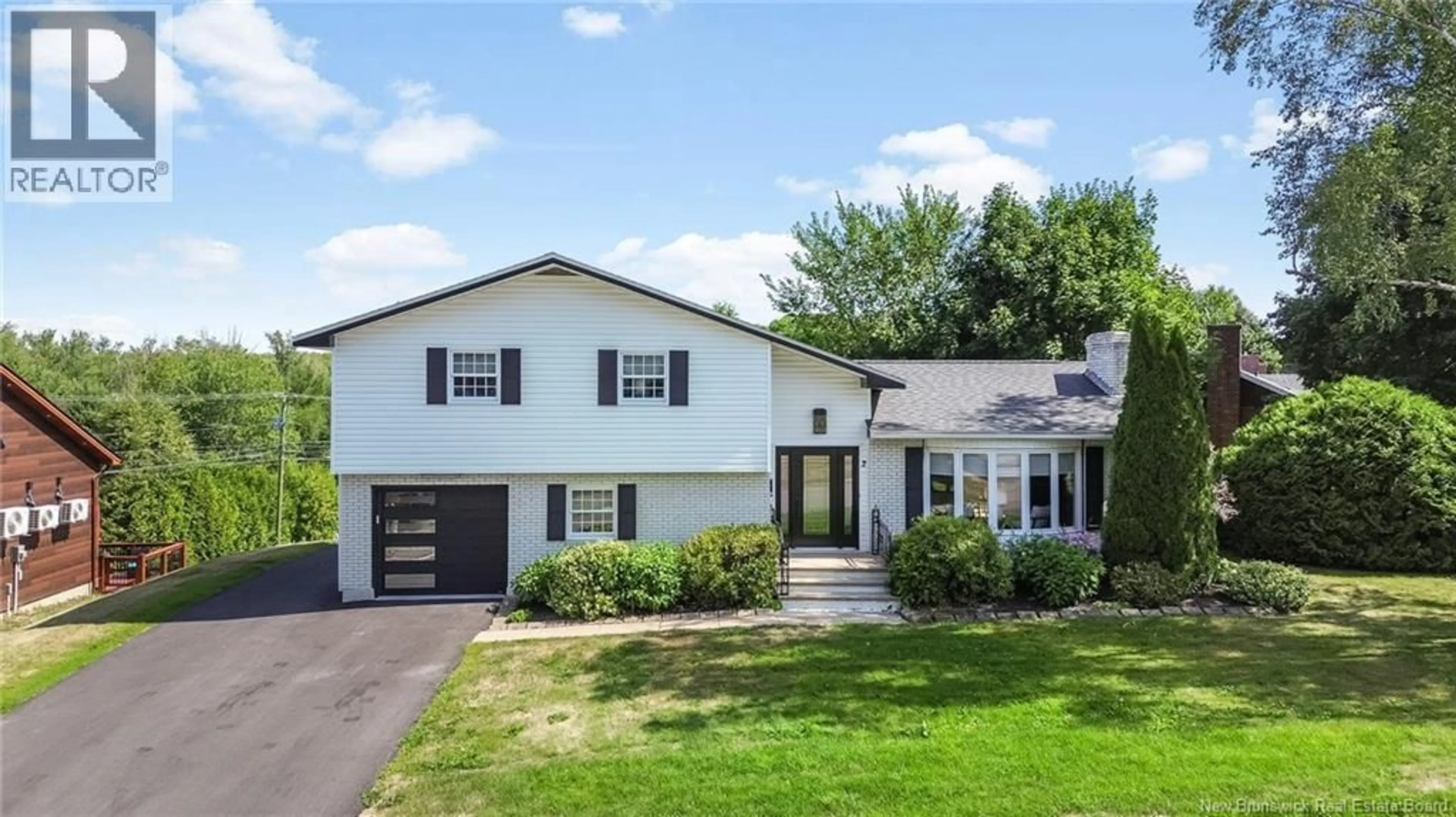 Home with vinyl exterior material, street for 2 WOOD STREET, Oromocto New Brunswick E2V2H7