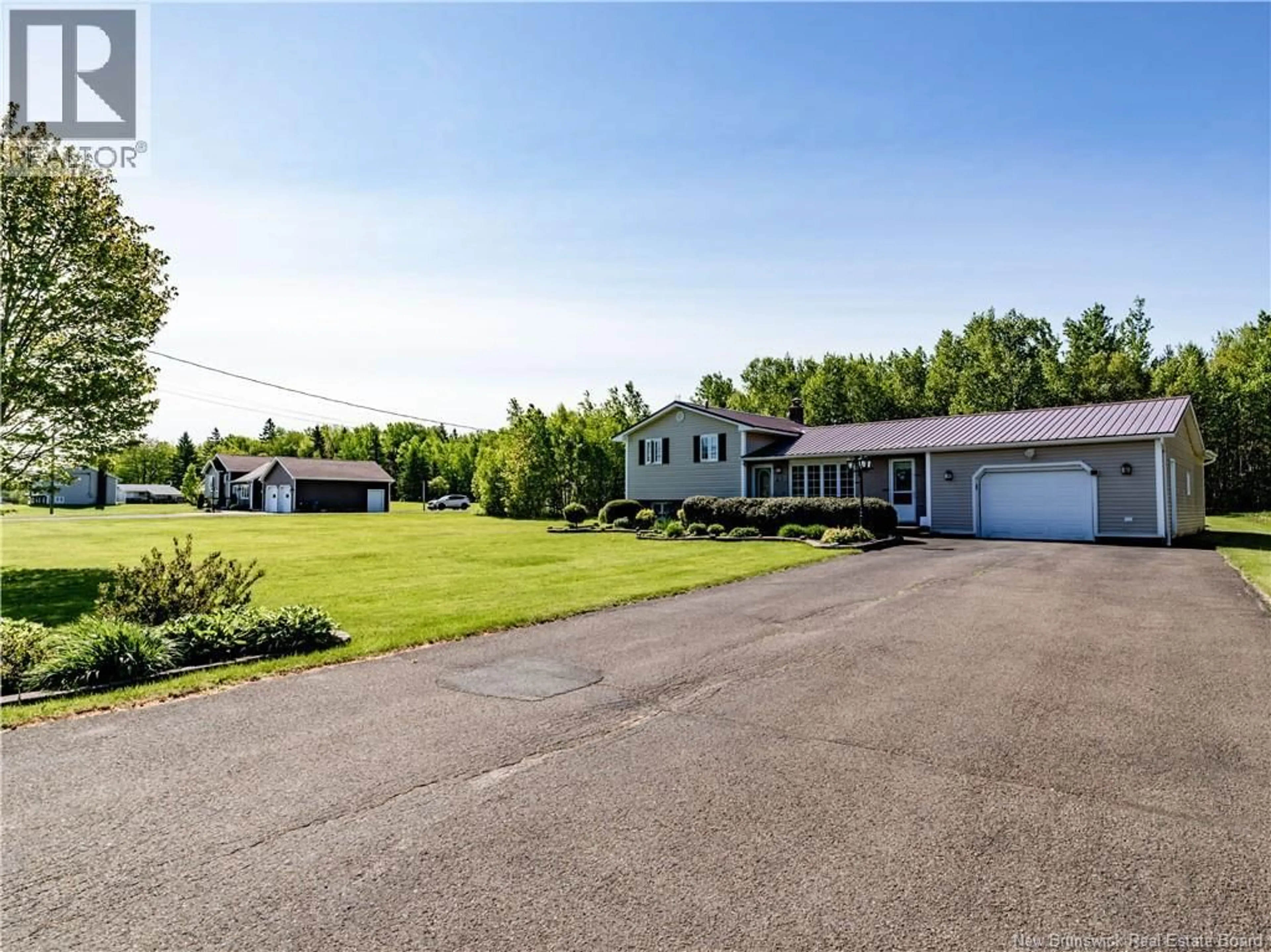 A pic from outside/outdoor area/front of a property/back of a property/a pic from drone, unknown for 117 DE L'EGLISE AVENUE, Saint-Antoine New Brunswick E4V1M2