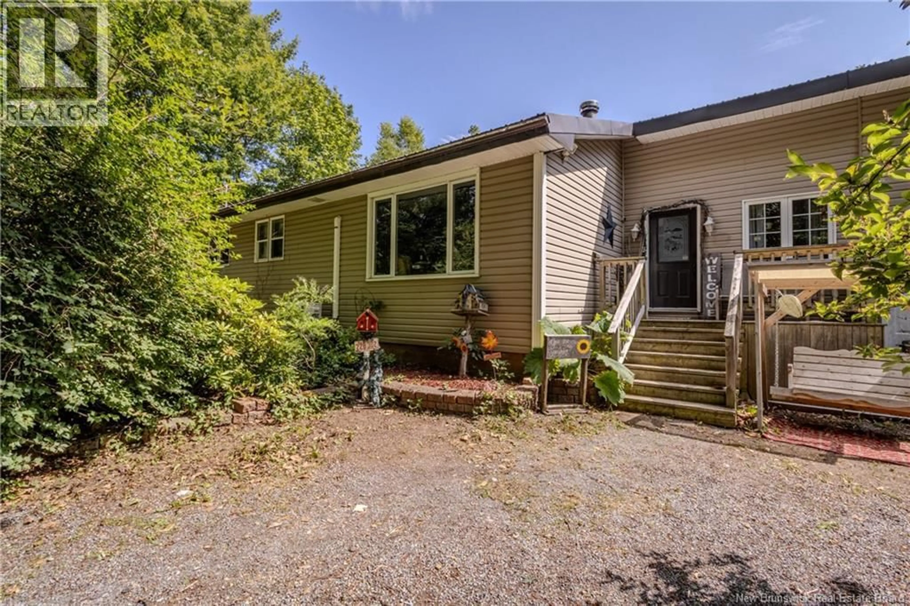 Home with vinyl exterior material, street for 52 PETTINGILL ROAD, Quispamsis New Brunswick E2E3R7