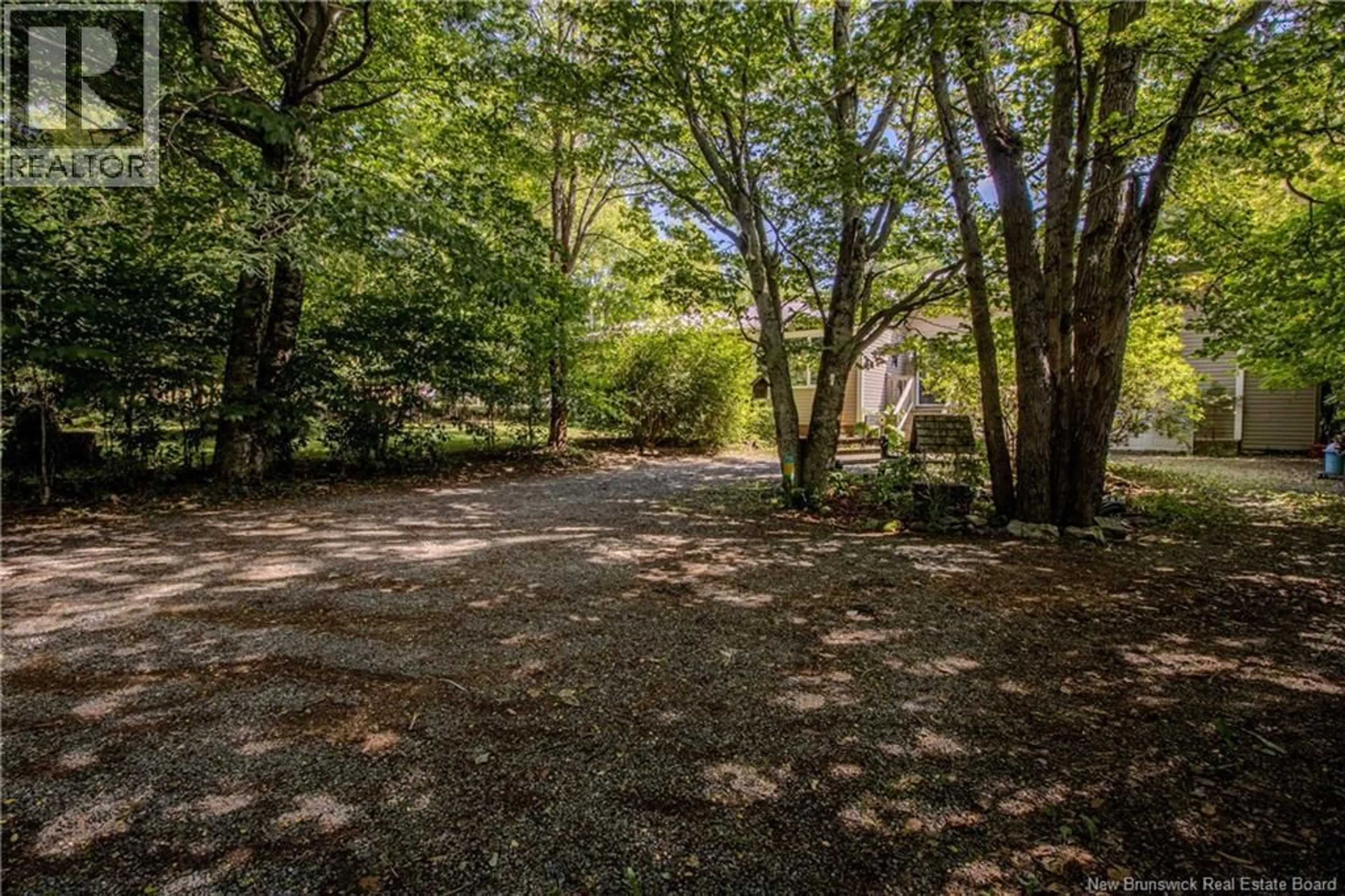 A pic from outside/outdoor area/front of a property/back of a property/a pic from drone, forest/trees view for 52 PETTINGILL ROAD, Quispamsis New Brunswick E2E3R7