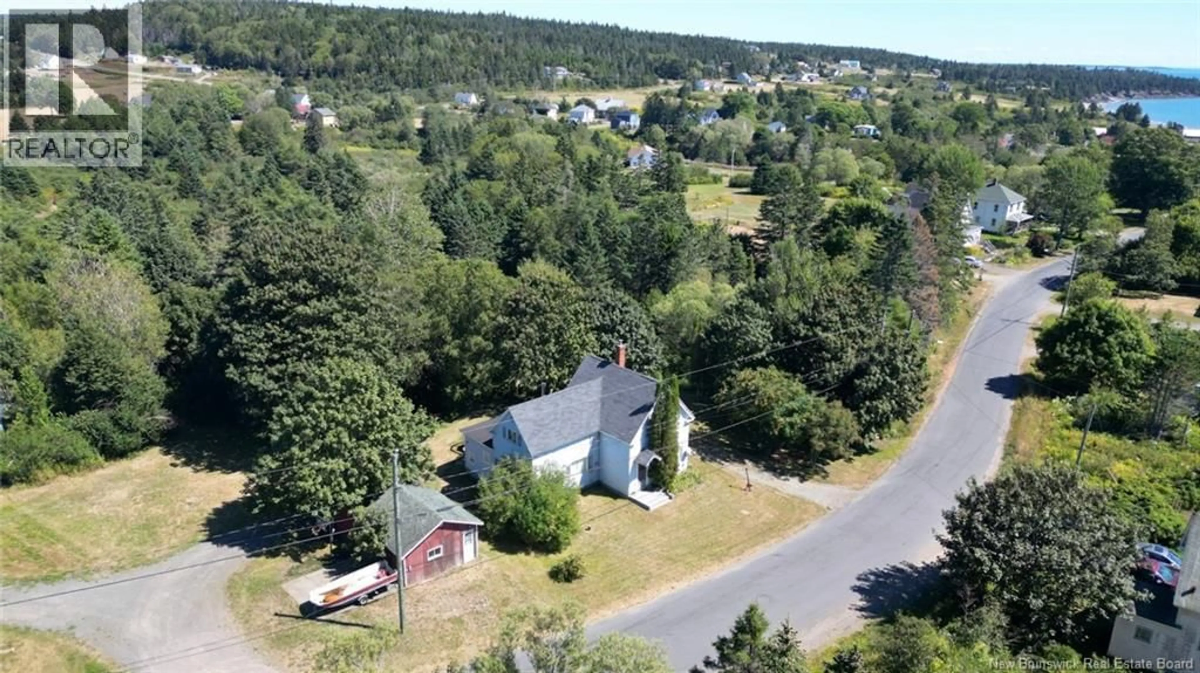 A pic from outside/outdoor area/front of a property/back of a property/a pic from drone, unknown for 28 KING STREET, Grand Manan New Brunswick E5G3J1
