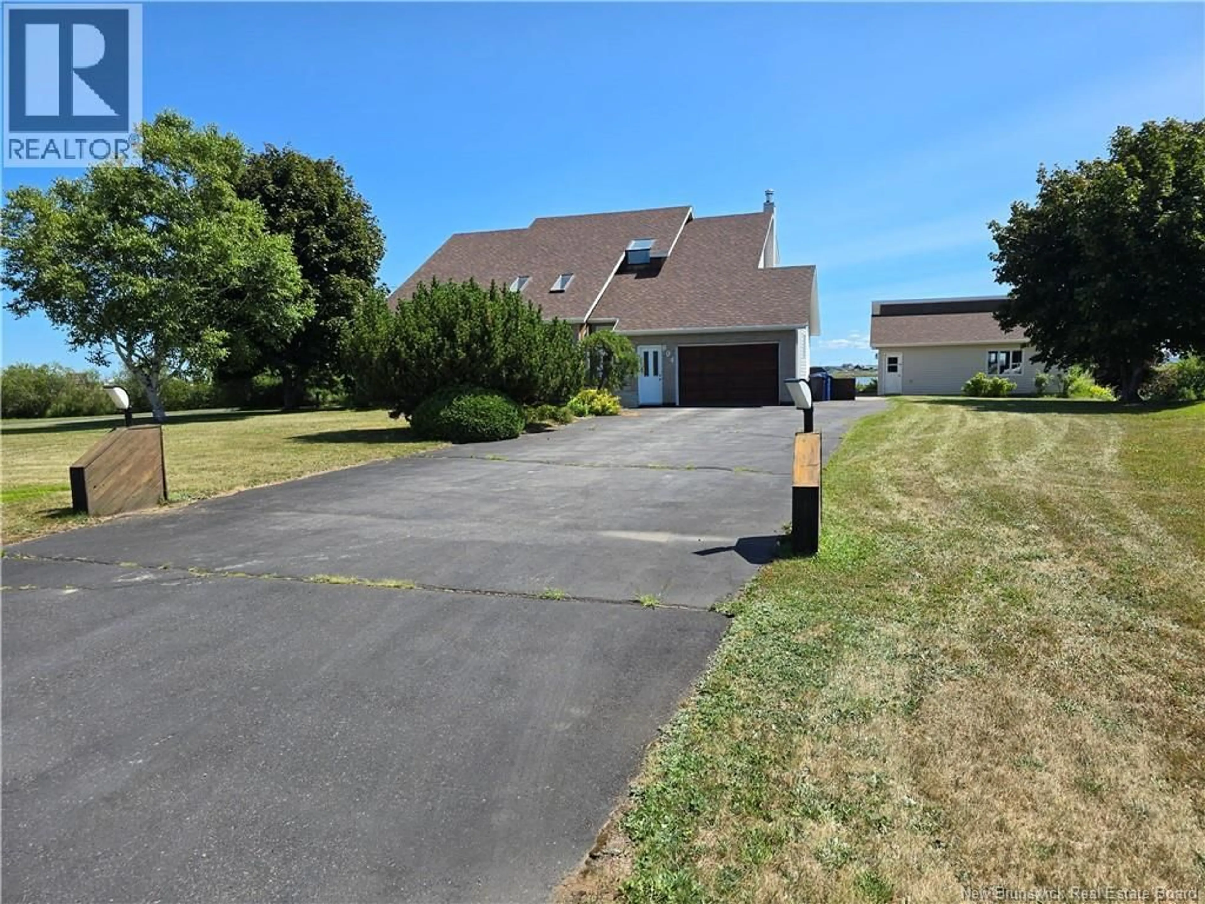 A pic from outside/outdoor area/front of a property/back of a property/a pic from drone, street for 804 ST PIERRE CRESCENT, Beresford New Brunswick E8K1S1