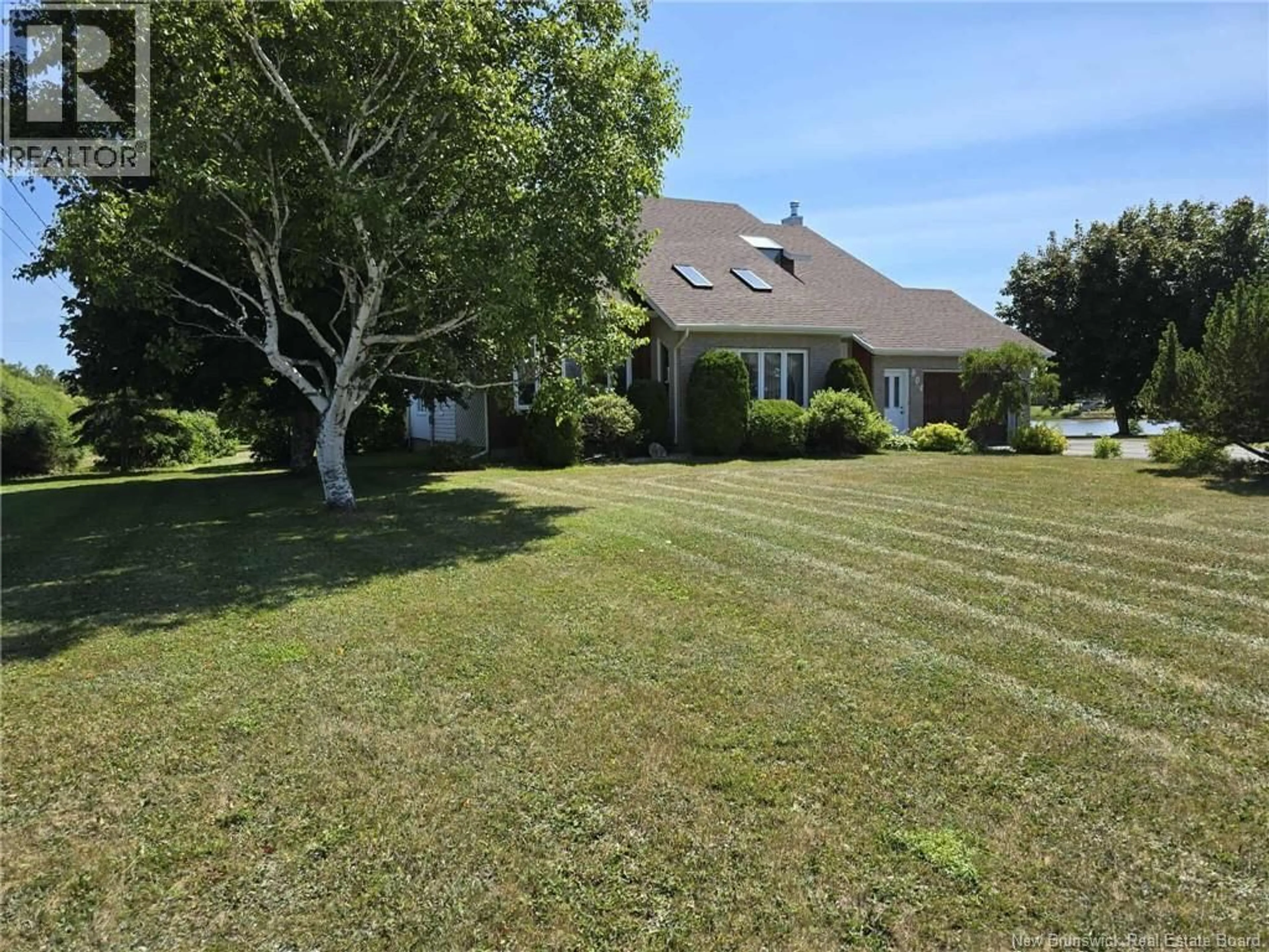A pic from outside/outdoor area/front of a property/back of a property/a pic from drone, street for 804 ST PIERRE CRESCENT, Beresford New Brunswick E8K1S1