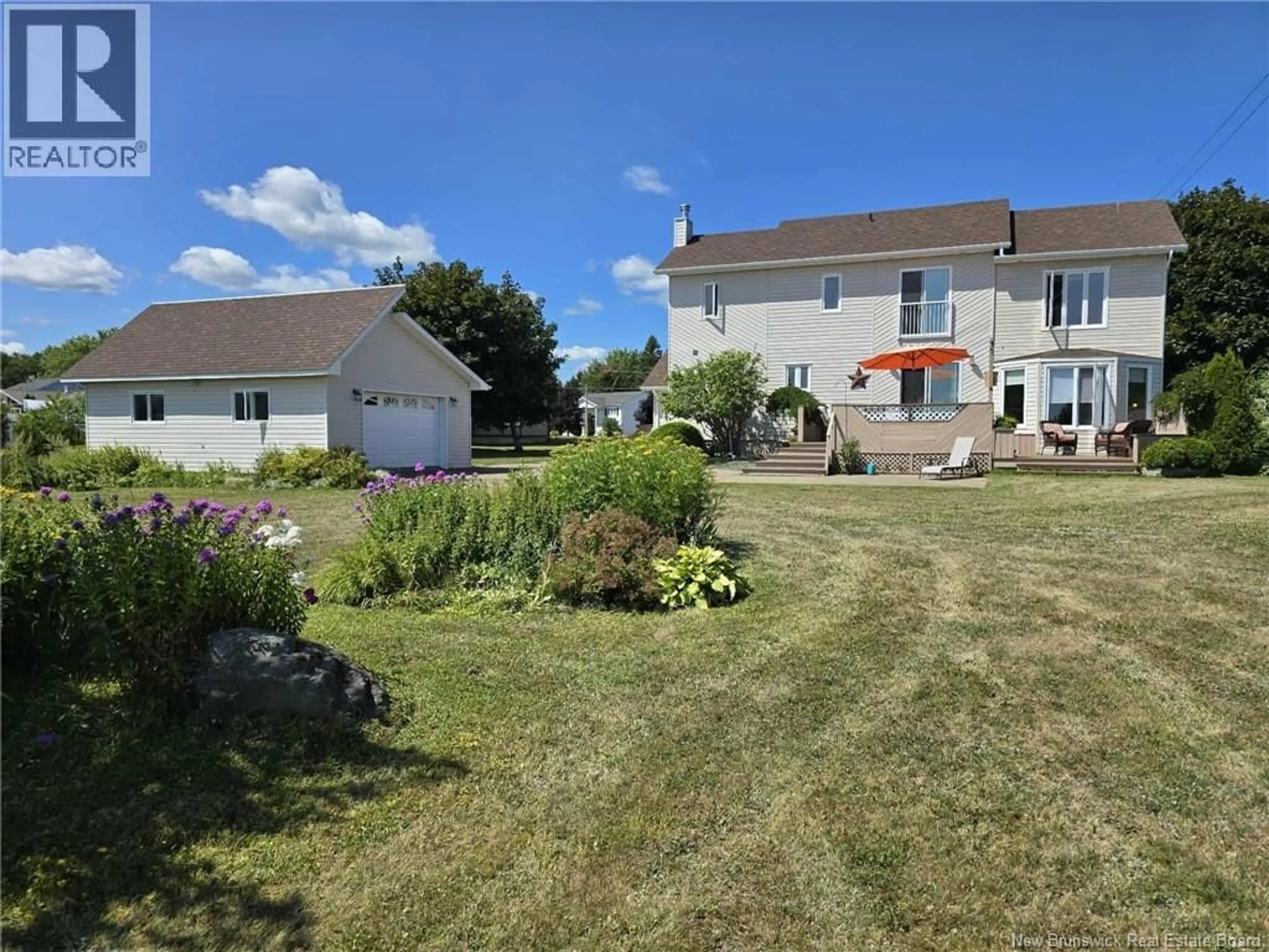 A pic from outside/outdoor area/front of a property/back of a property/a pic from drone, unknown for 804 ST PIERRE CRESCENT, Beresford New Brunswick E8K1S1
