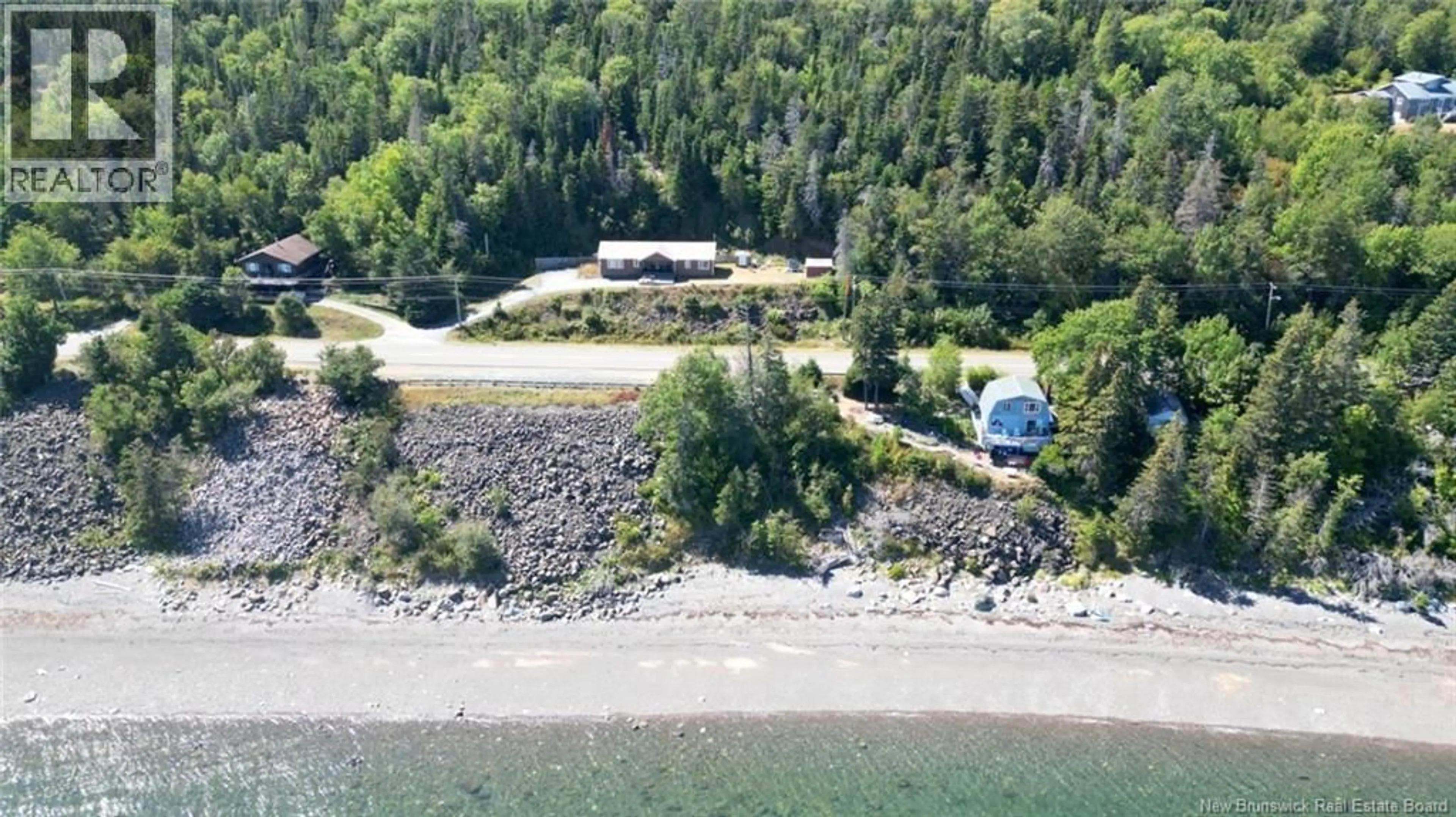 A pic from outside/outdoor area/front of a property/back of a property/a pic from drone, water/lake/river/ocean view for 312 ROUTE 776, Grand Manan New Brunswick E5G1A5