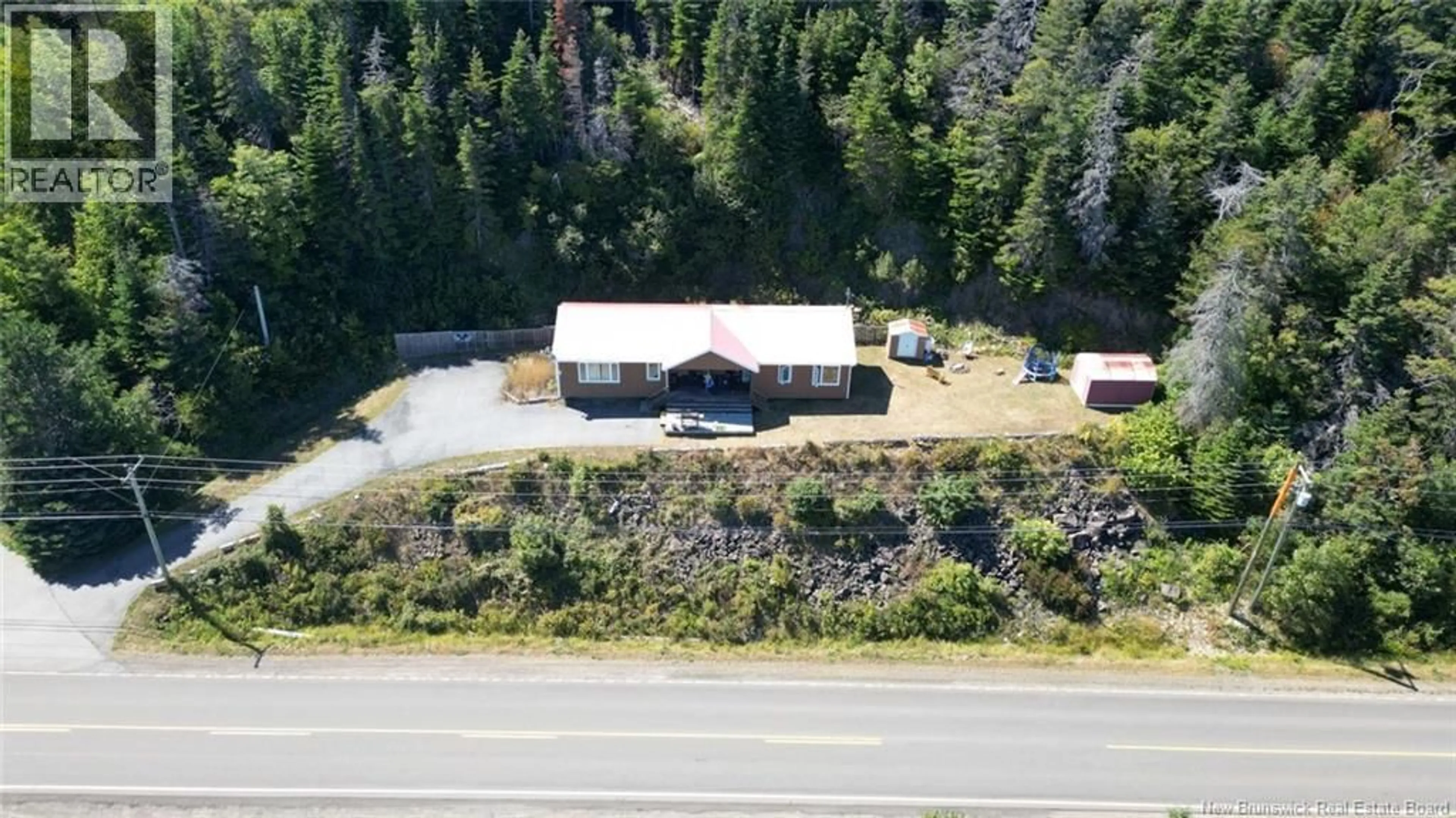 A pic from outside/outdoor area/front of a property/back of a property/a pic from drone, unknown for 312 ROUTE 776, Grand Manan New Brunswick E5G1A5