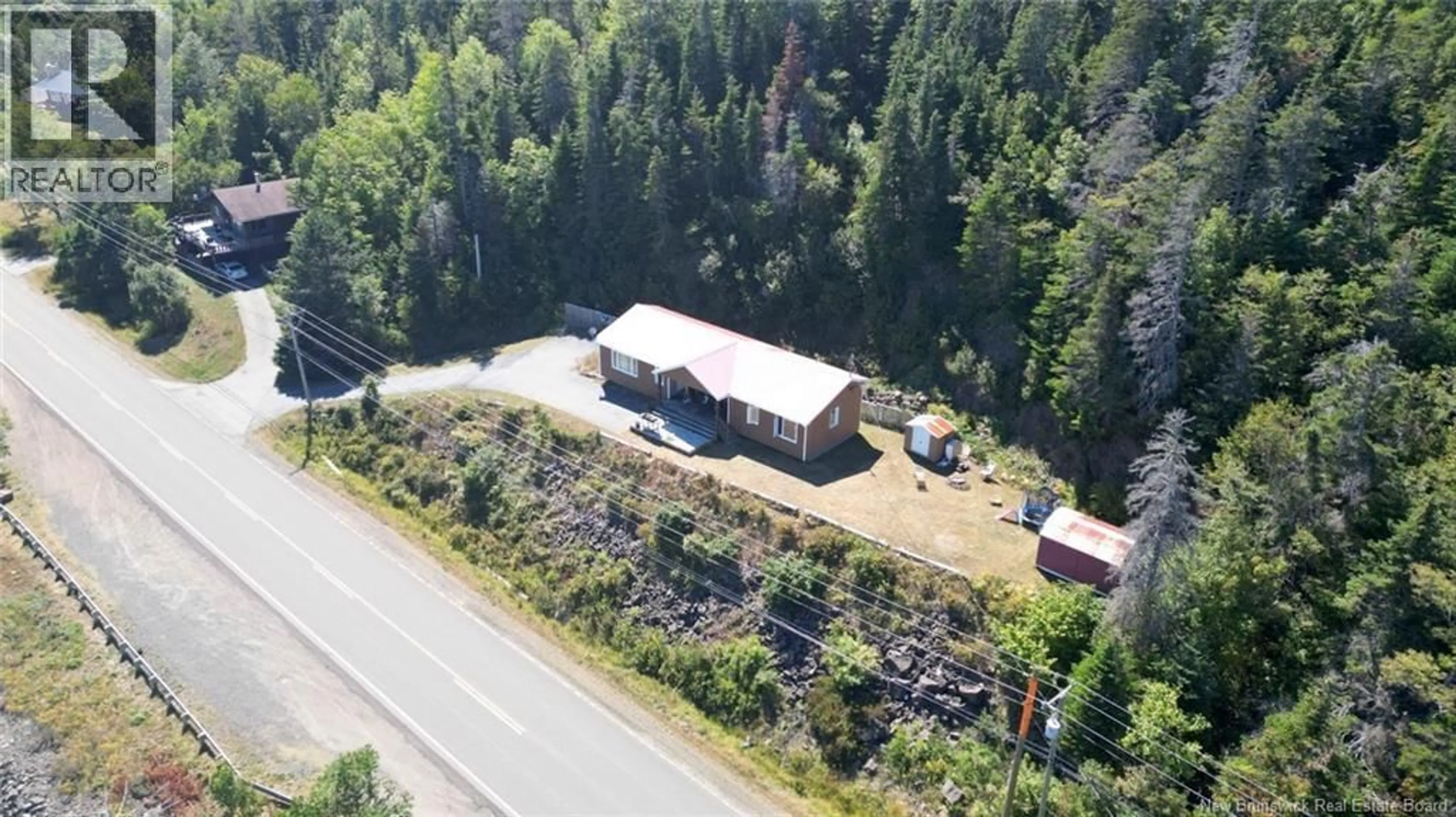 A pic from outside/outdoor area/front of a property/back of a property/a pic from drone, building for 312 ROUTE 776, Grand Manan New Brunswick E5G1A5