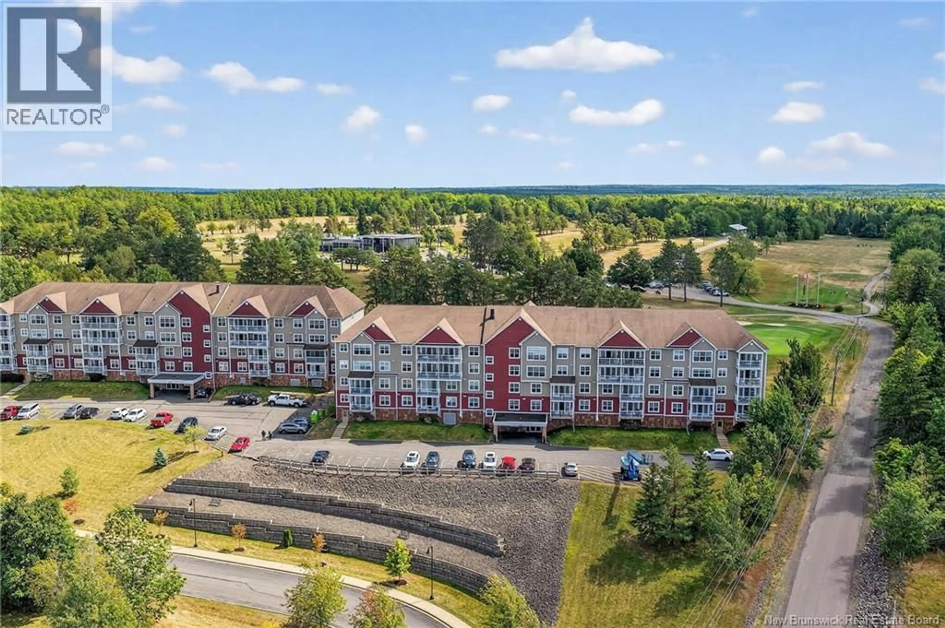 A pic from outside/outdoor area/front of a property/back of a property/a pic from drone, unknown for 401 - 208 COVERDALE ROAD, Riverview New Brunswick E1B3J6