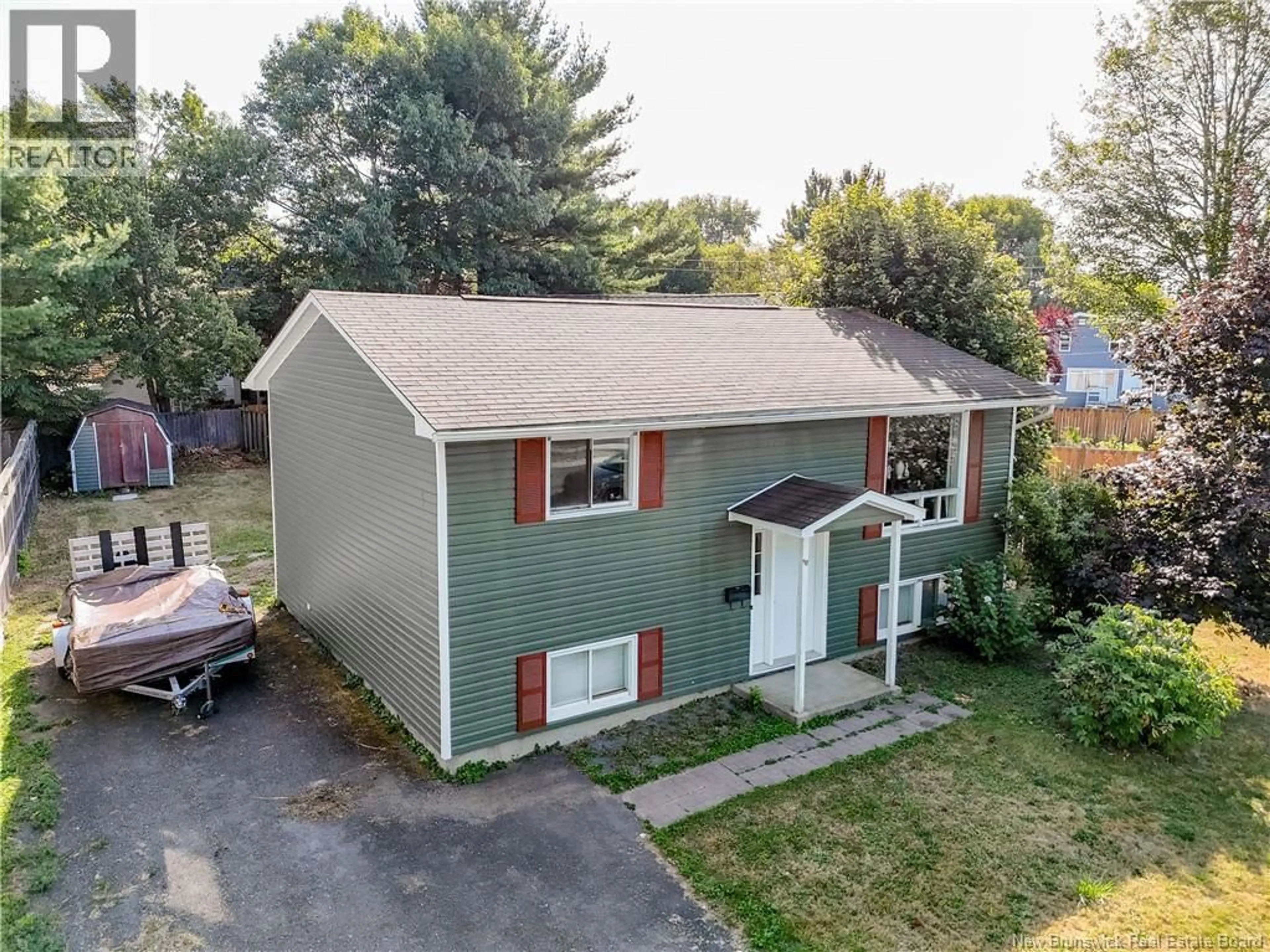 A pic from outside/outdoor area/front of a property/back of a property/a pic from drone, street for 98 MCADAM AVENUE, Fredericton New Brunswick E3A1G4