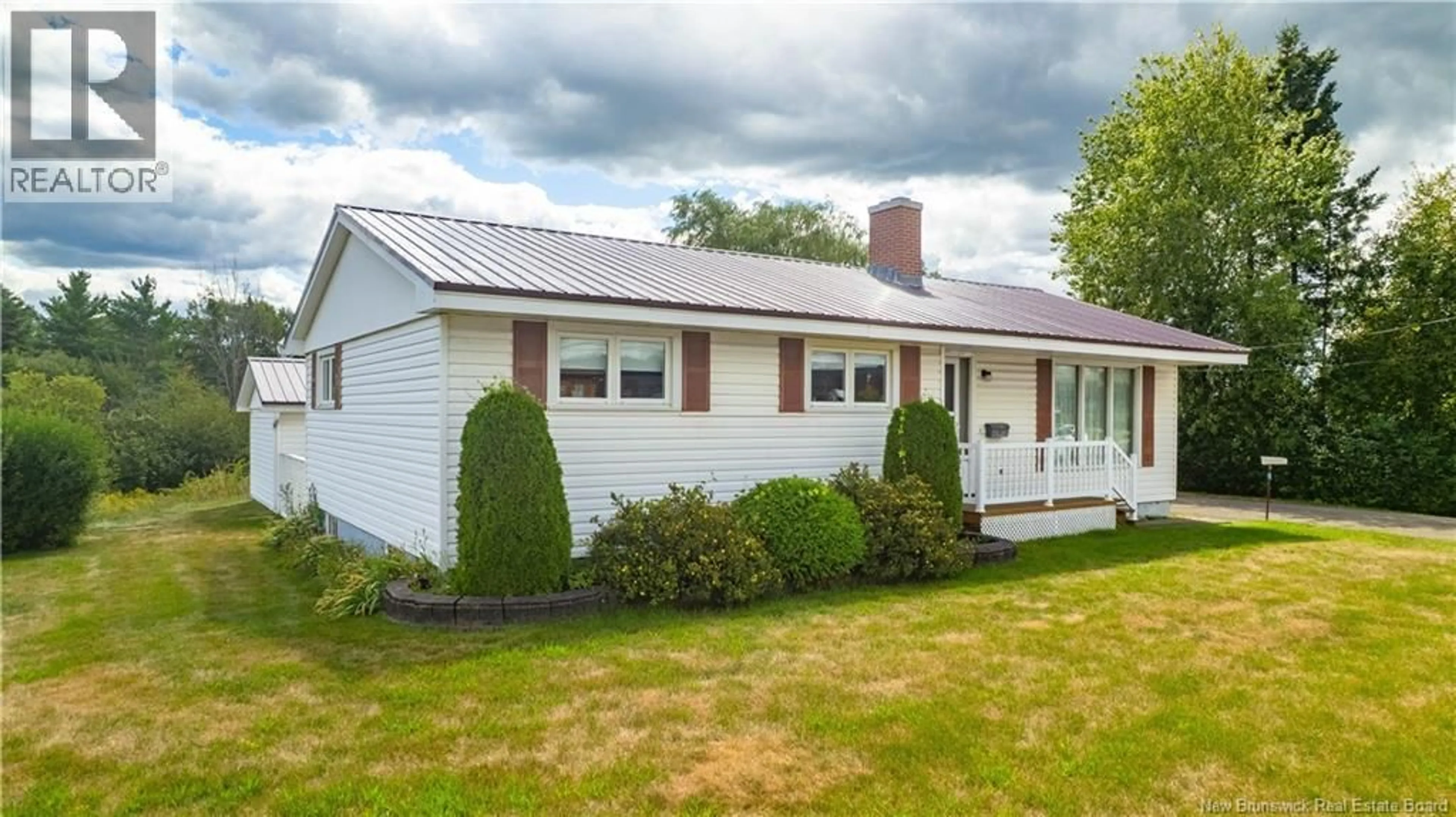 Home with vinyl exterior material, street for 10 170 ROUTE ROUTE, St. Stephen New Brunswick E3L2Y8