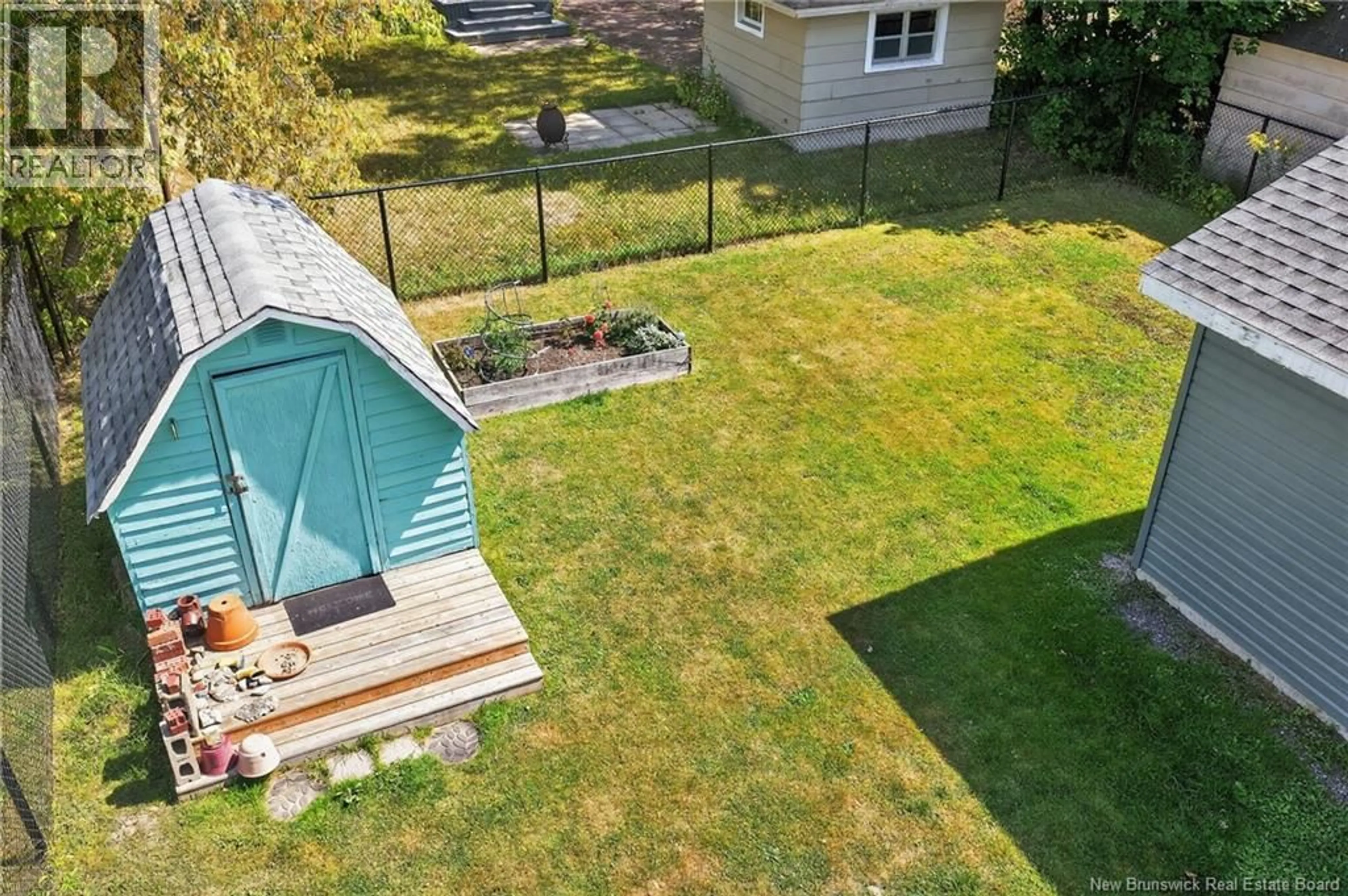 A pic from outside/outdoor area/front of a property/back of a property/a pic from drone, water/lake/river/ocean view for 7 FIFTH STREET, Moncton New Brunswick E1E3G8
