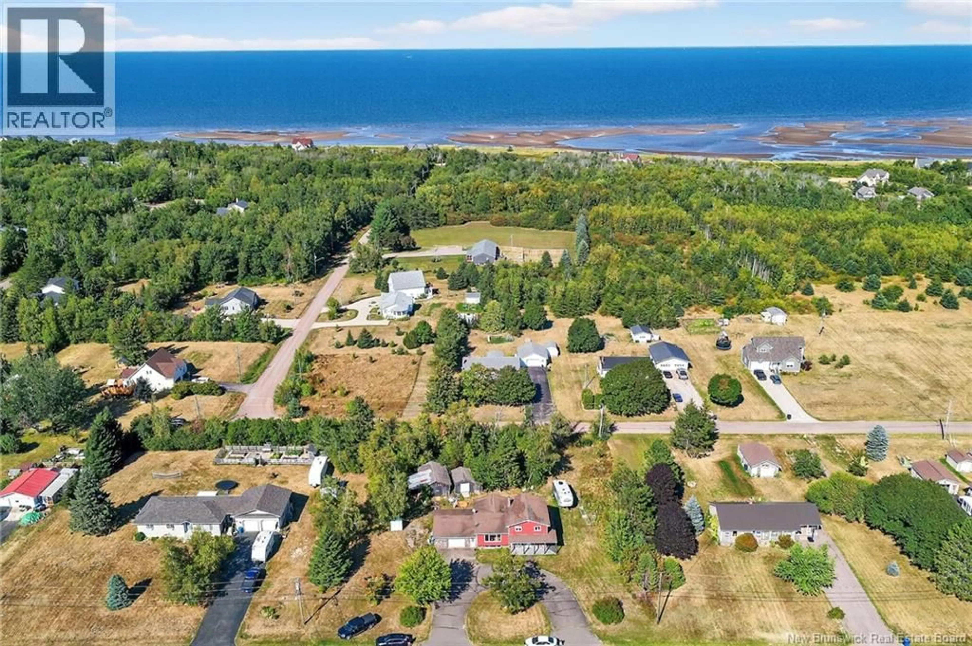 A pic from outside/outdoor area/front of a property/back of a property/a pic from drone, water/lake/river/ocean view for 44 PAUL, Grand-Barachois New Brunswick E4P7Y5
