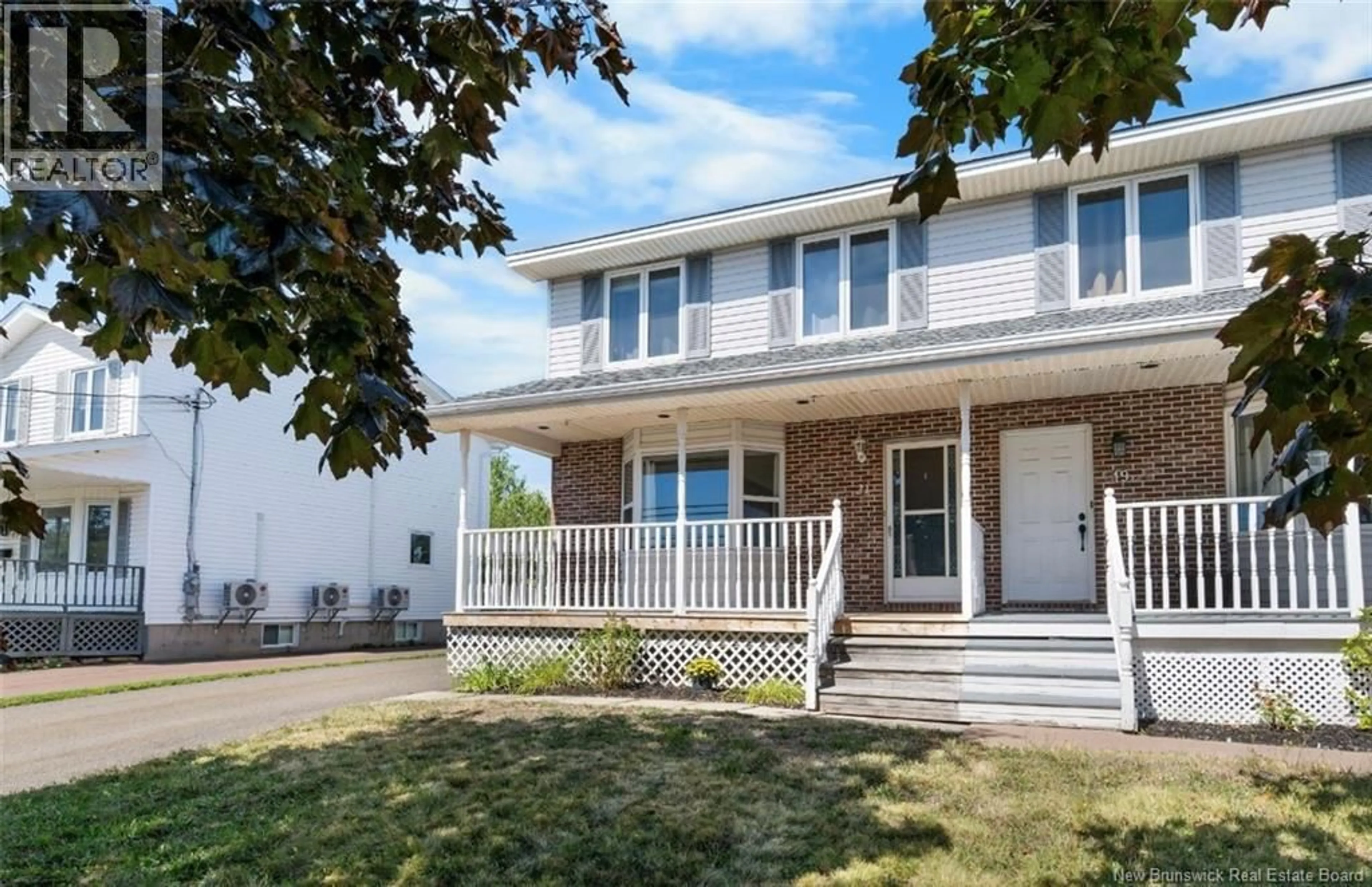Home with vinyl exterior material, street for 21 RENNICK ROAD, Moncton New Brunswick E1G2G8