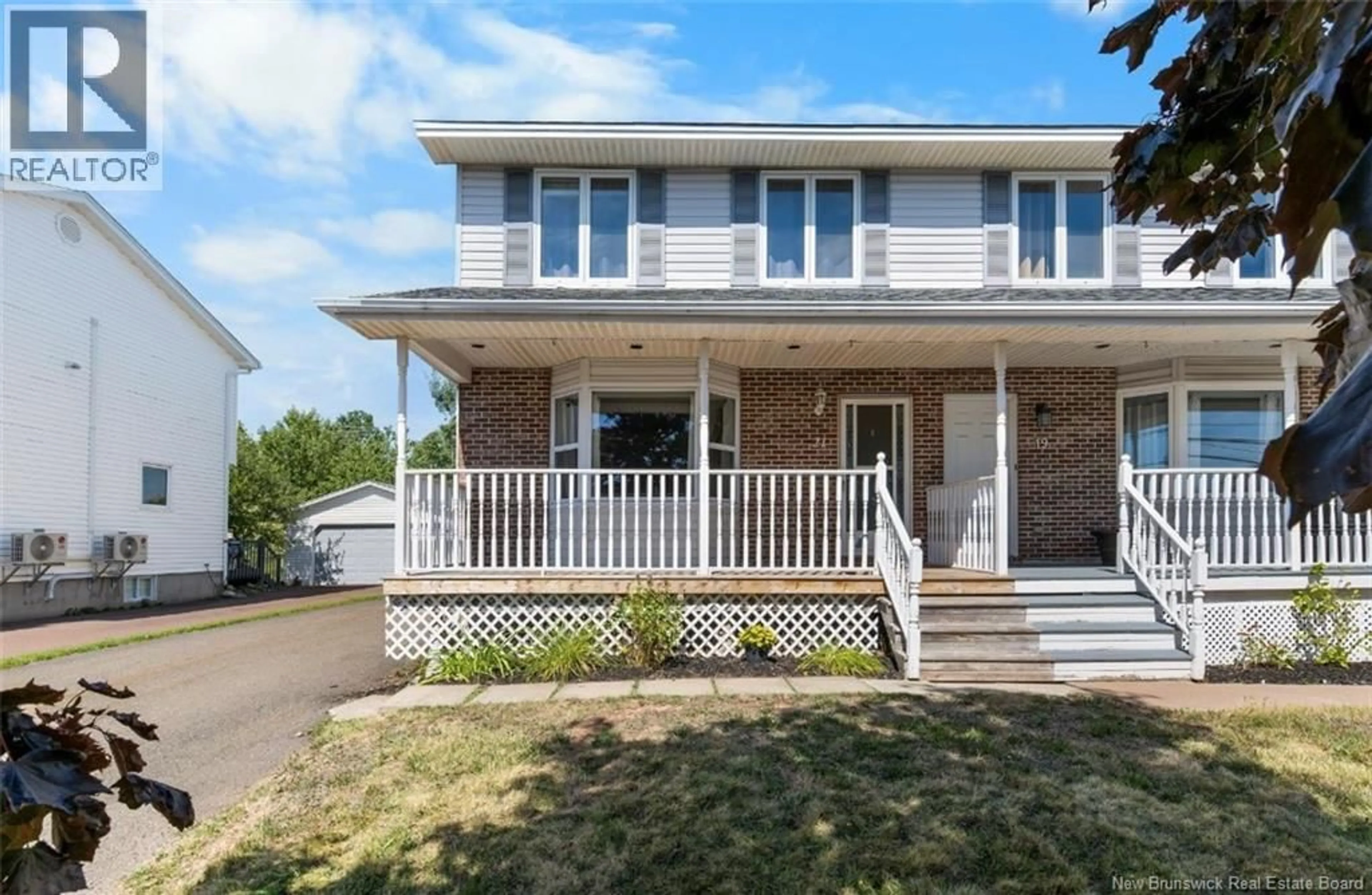 Home with vinyl exterior material, street for 21 RENNICK ROAD, Moncton New Brunswick E1G2G8