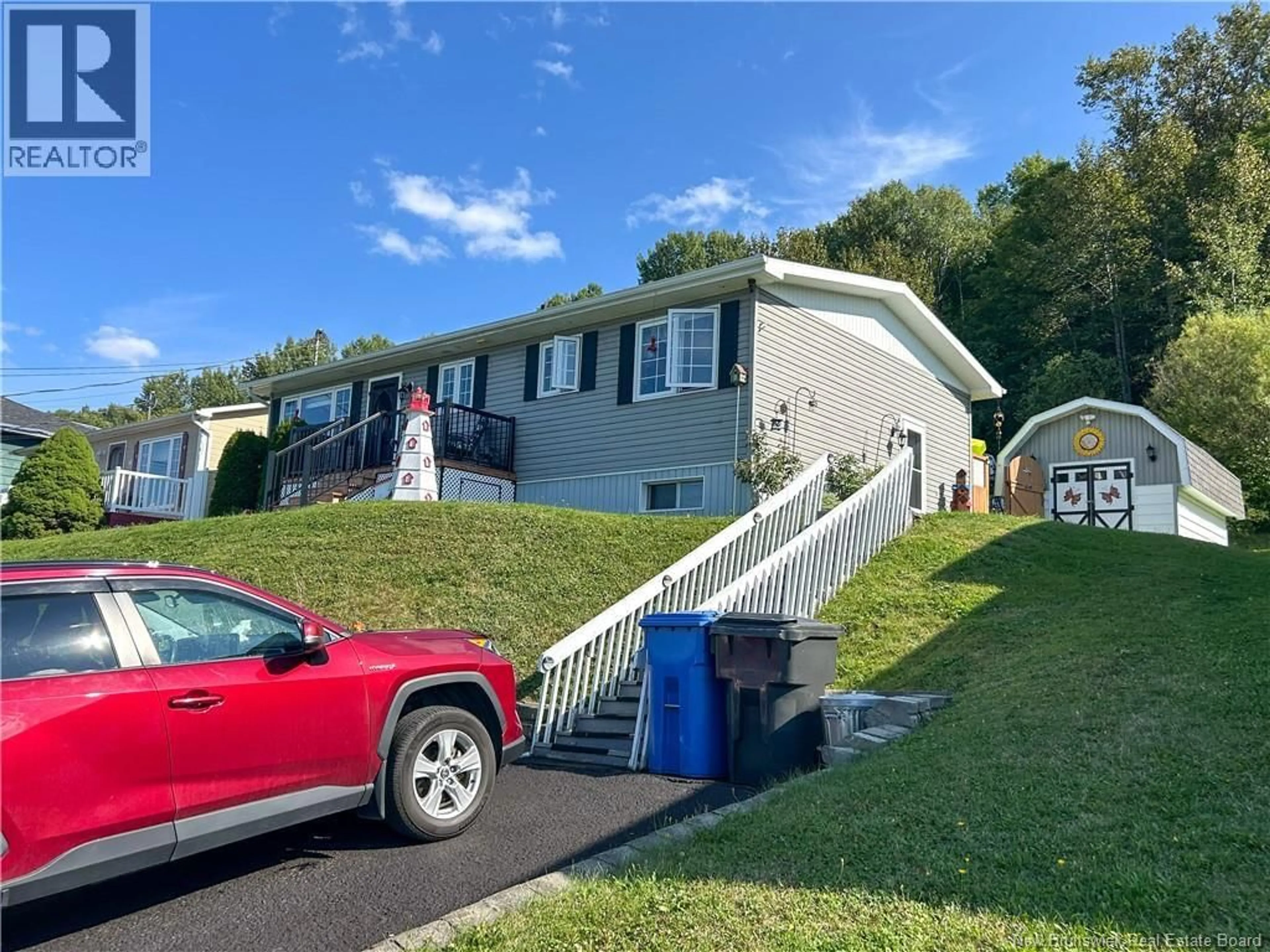 Home with vinyl exterior material, unknown for 320 BELLEVUE STREET, Atholville New Brunswick E3N4E7