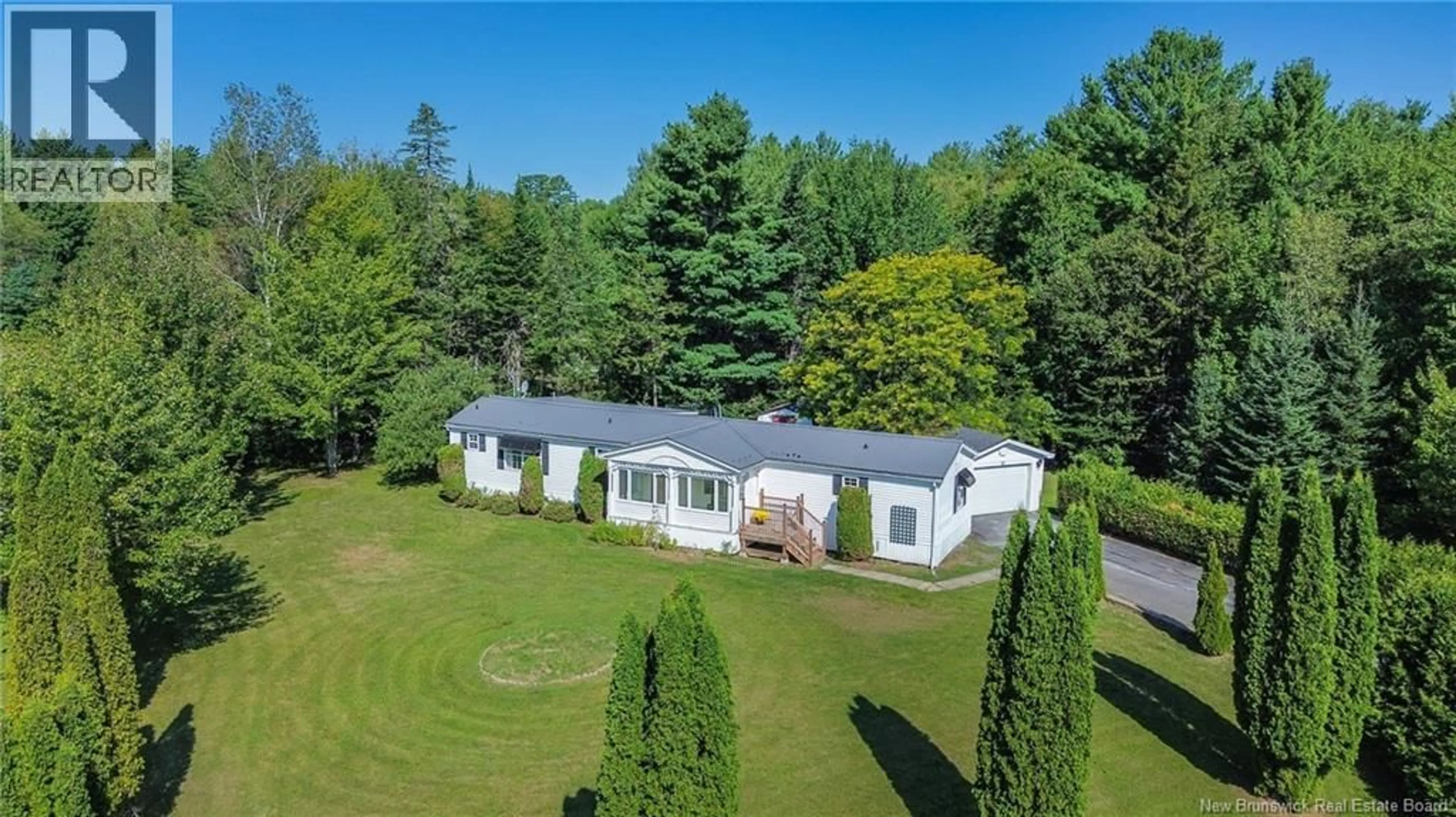 A pic from outside/outdoor area/front of a property/back of a property/a pic from drone, unknown for 27 PRESTIGE DRIVE, Lincoln New Brunswick E3B7J1