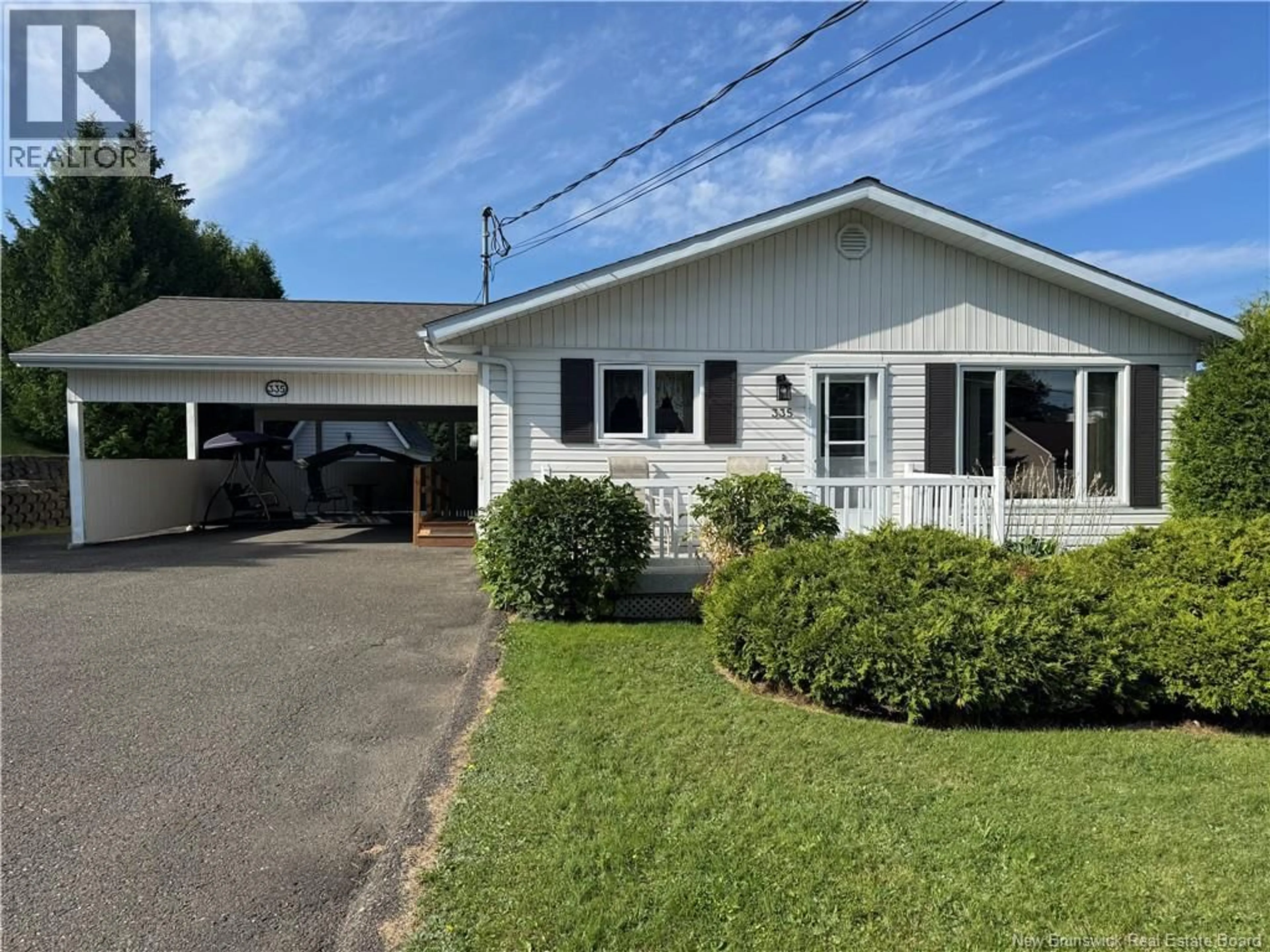 Home with vinyl exterior material, street for 335 ALLAIN STREET, Grand-Sault/Grand Falls New Brunswick E3Y1E4