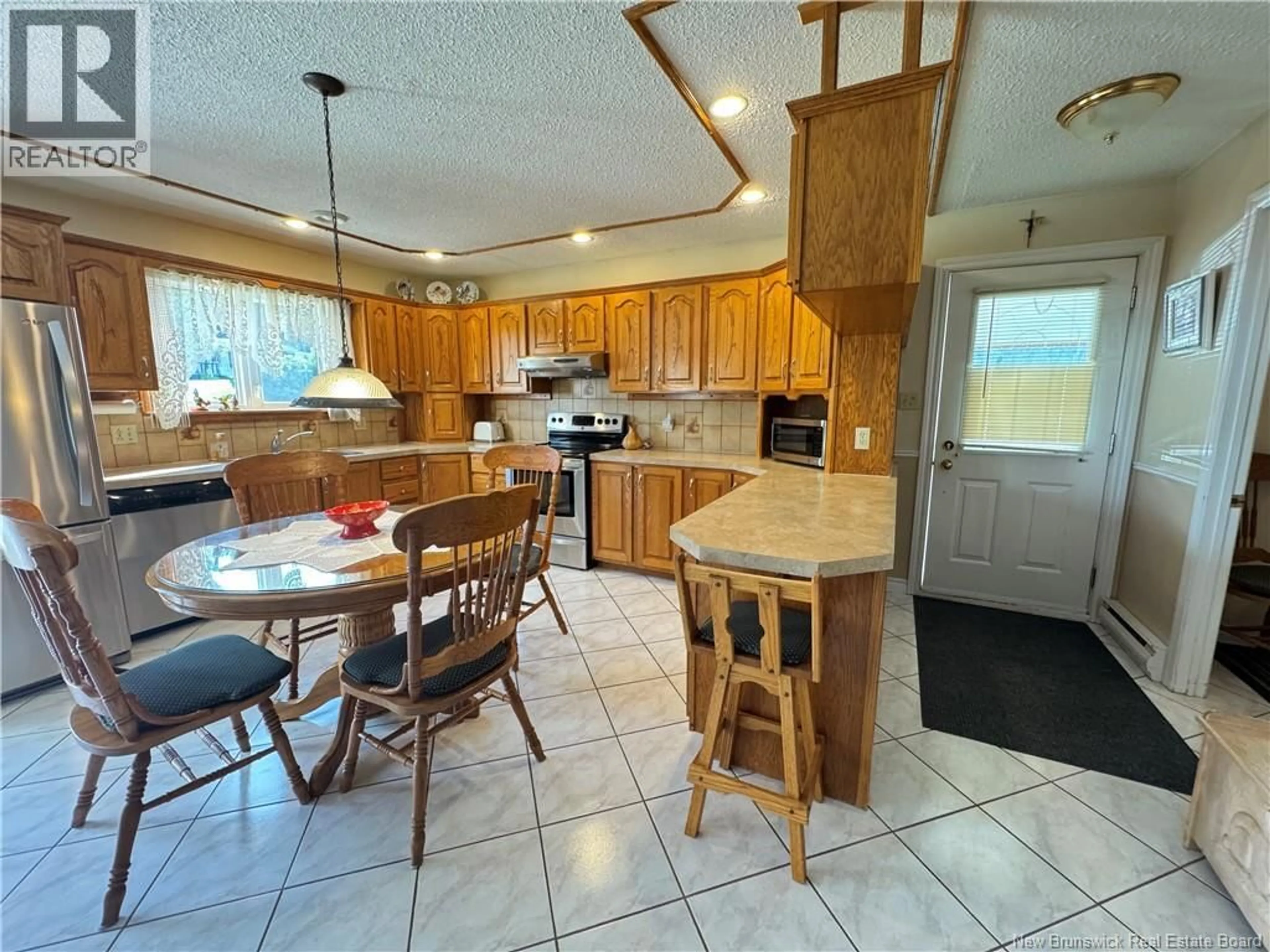 Open concept kitchen, ceramic/tile floor for 335 ALLAIN STREET, Grand-Sault/Grand Falls New Brunswick E3Y1E4