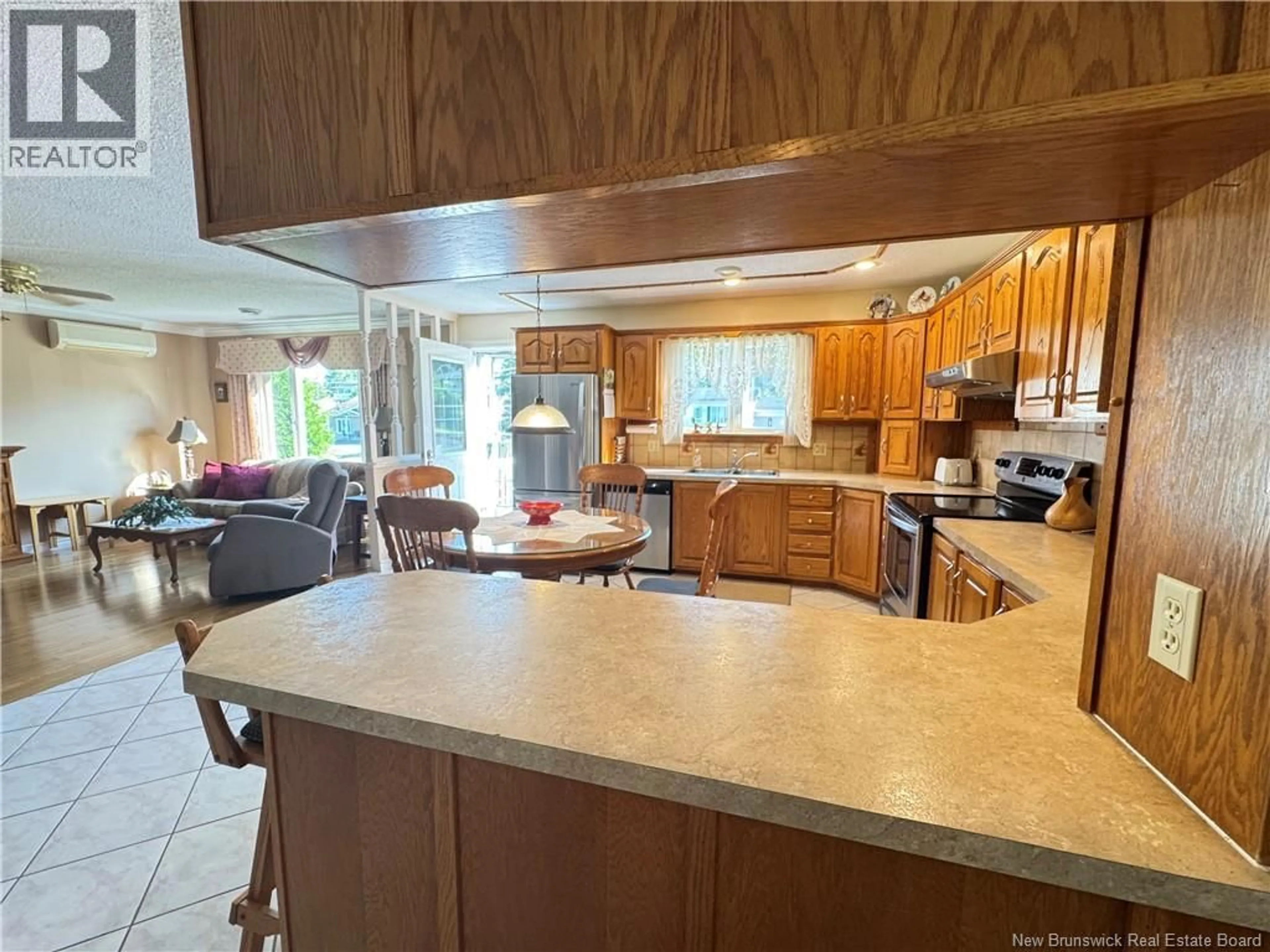Open concept kitchen, ceramic/tile floor for 335 ALLAIN STREET, Grand-Sault/Grand Falls New Brunswick E3Y1E4