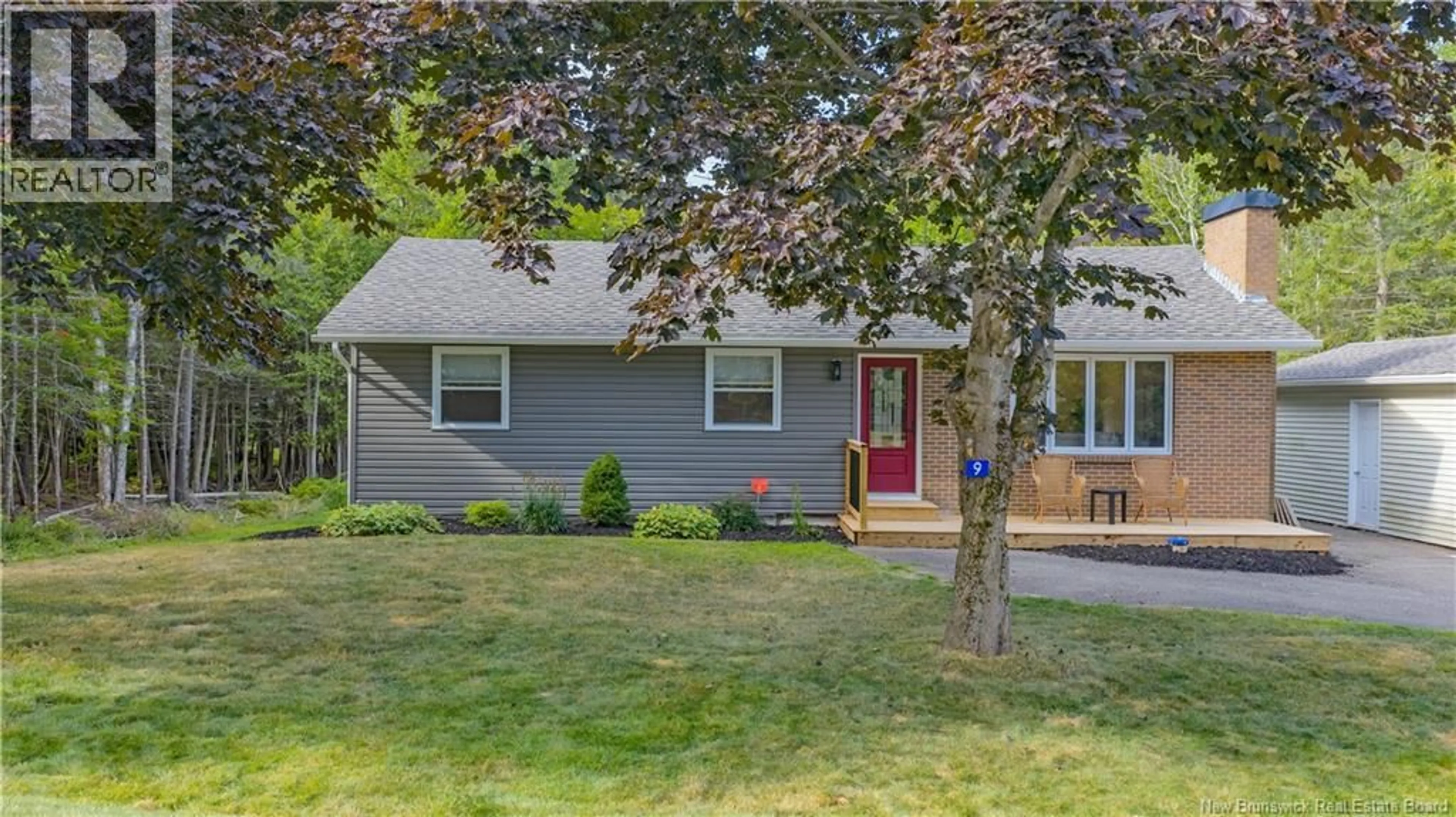 Home with vinyl exterior material, street for 9 STONEYCROFT ROAD, Quispamsis New Brunswick E2E4R1