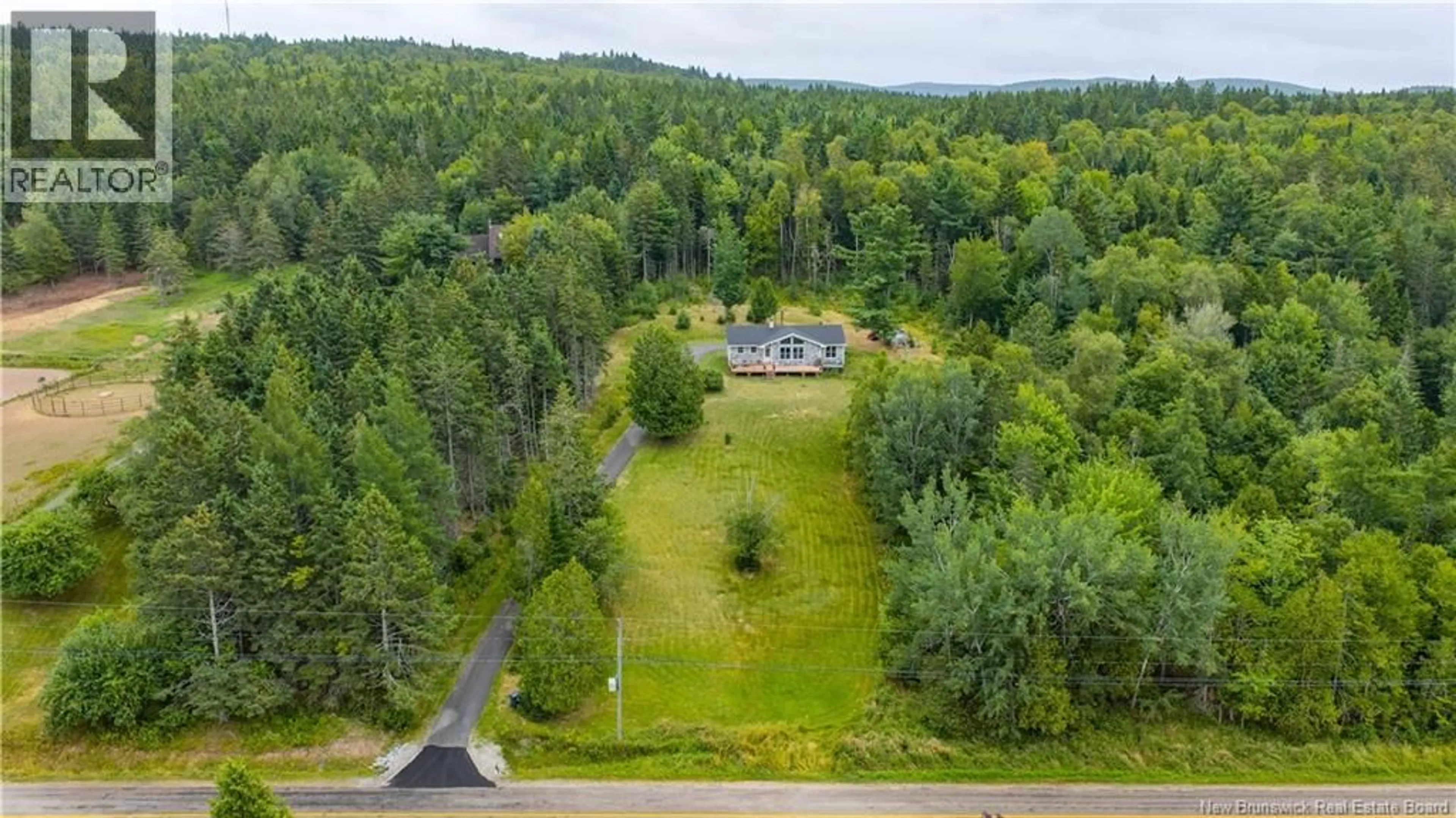 A pic from outside/outdoor area/front of a property/back of a property/a pic from drone, forest/trees view for 380 BONNEY ROAD, Nauwigewauk New Brunswick E5N7A6