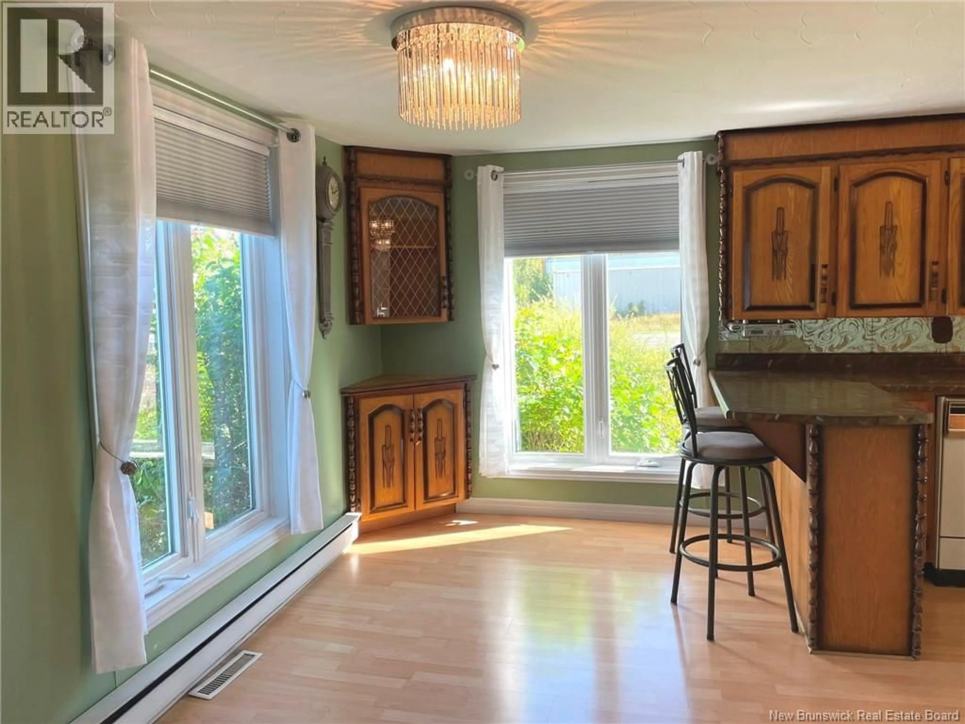 Dining room, wood/laminate floor for 546 DES MOULINS, Saint-Andre-LeBlanc New Brunswick E4P6A3