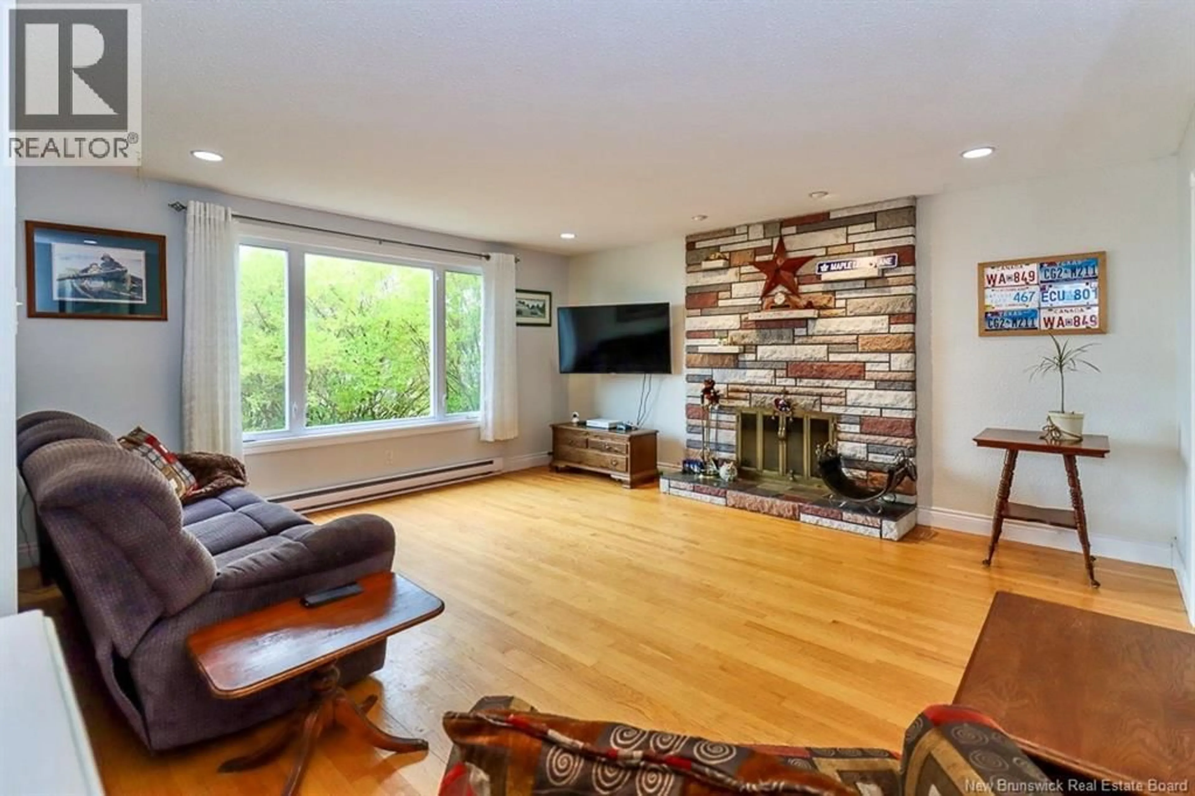 Living room with furniture, wood/laminate floor for 29 WILDWOOD STREET, Saint John New Brunswick E2J2V9