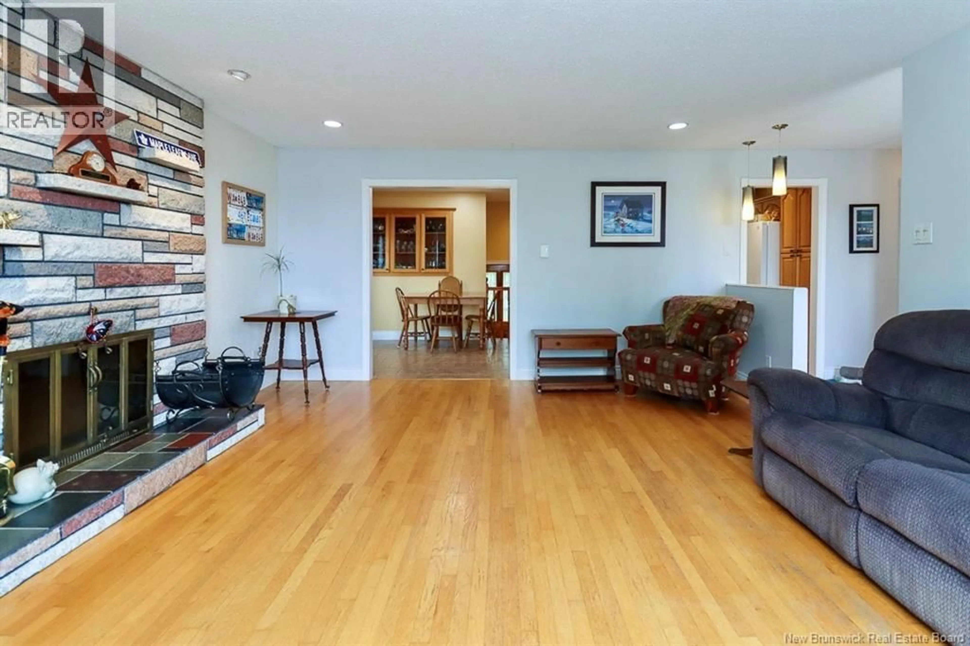 Living room with furniture, wood/laminate floor for 29 WILDWOOD STREET, Saint John New Brunswick E2J2V9