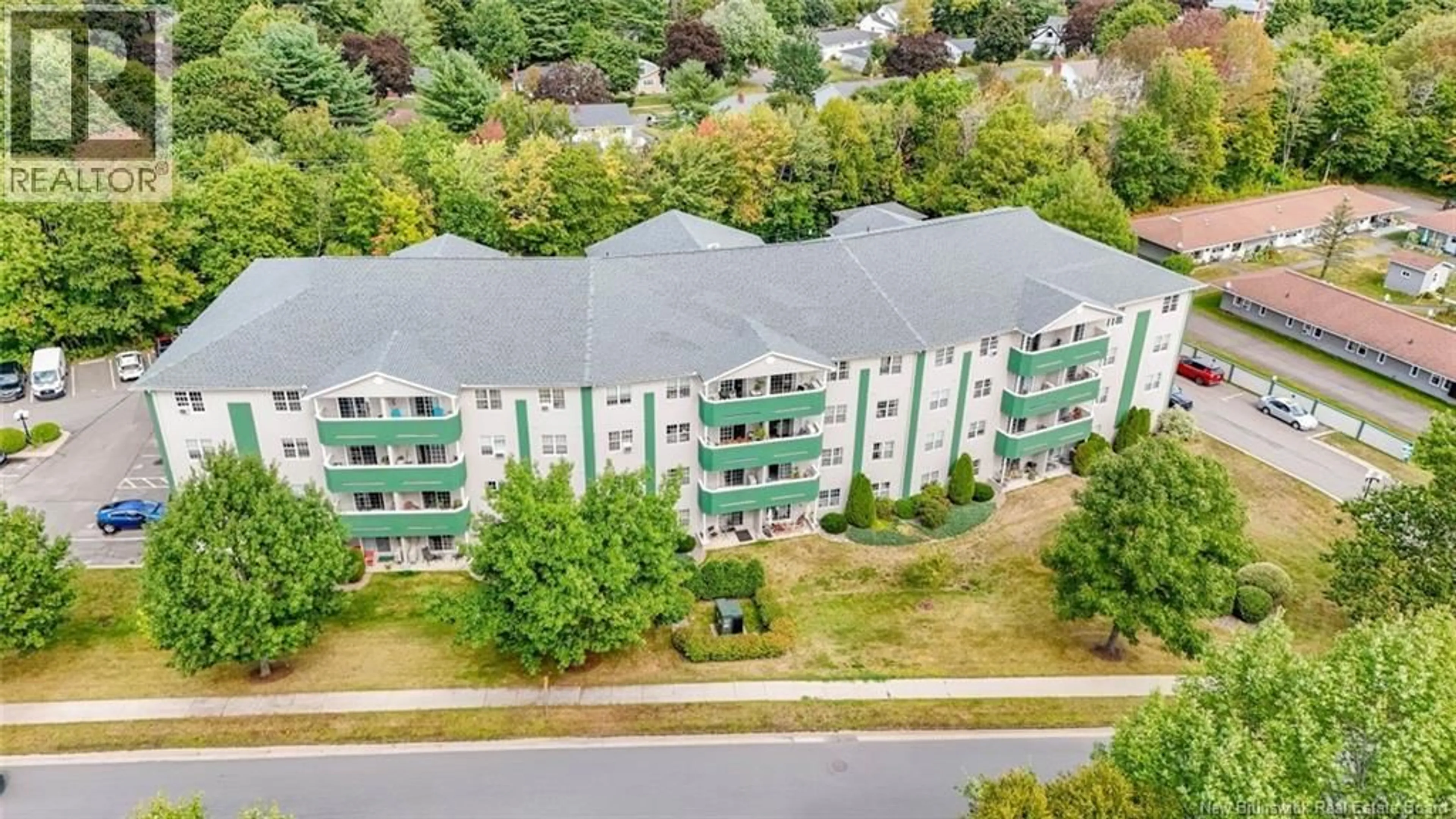 A pic from outside/outdoor area/front of a property/back of a property/a pic from drone, unknown for 308 - 158 HANWELL ROAD, Fredericton New Brunswick E3B9K7