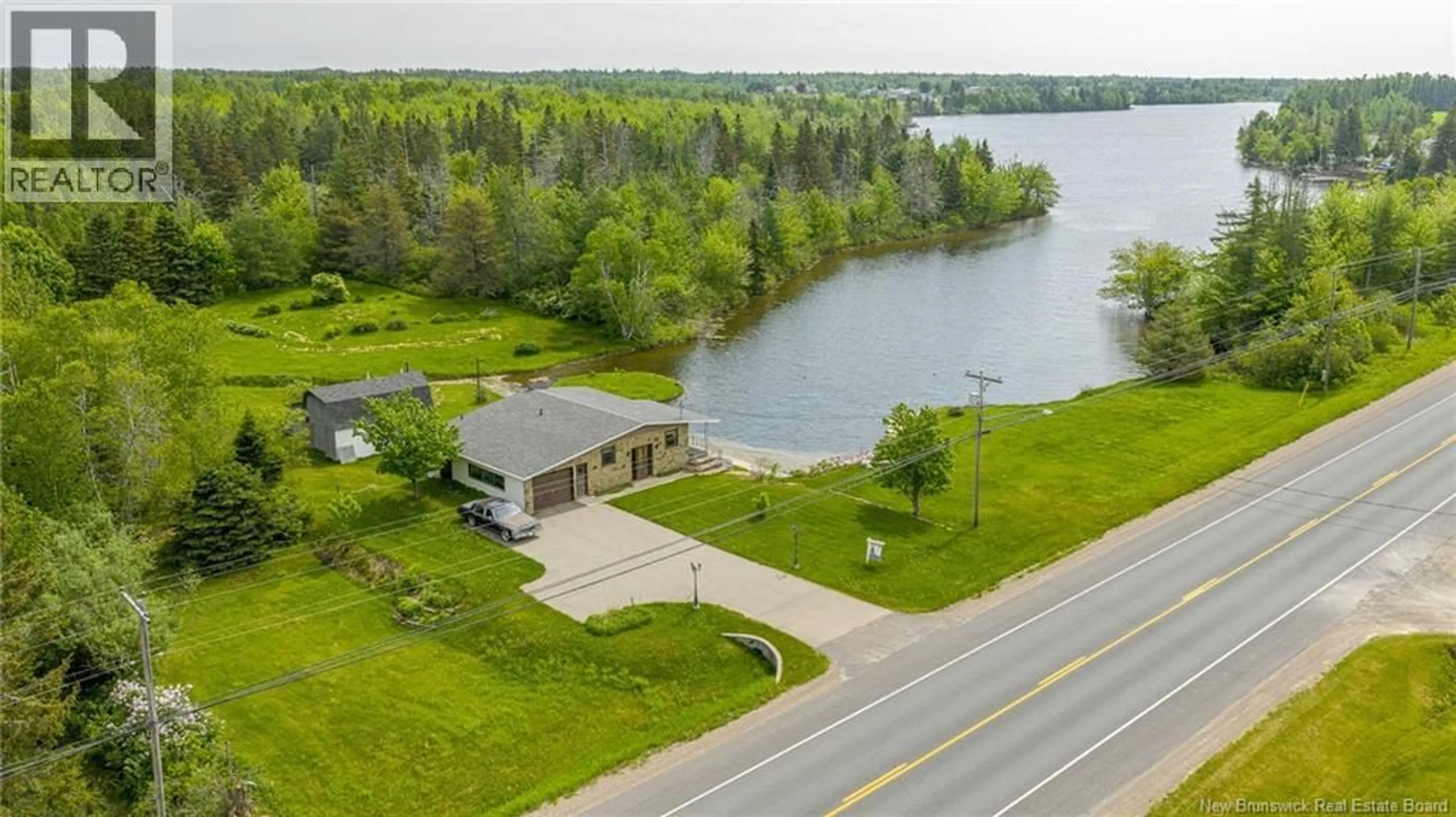 A pic from outside/outdoor area/front of a property/back of a property/a pic from drone, water/lake/river/ocean view for 11700 ROUTE 11, Pokemouche New Brunswick E8P1K4